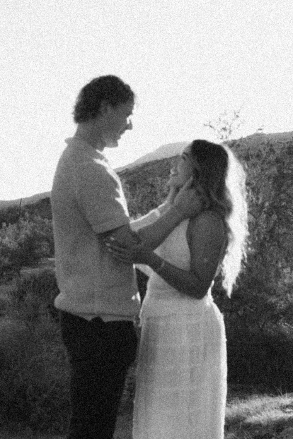 Couple smiling together during a natural light session in Phoenix Arizona.