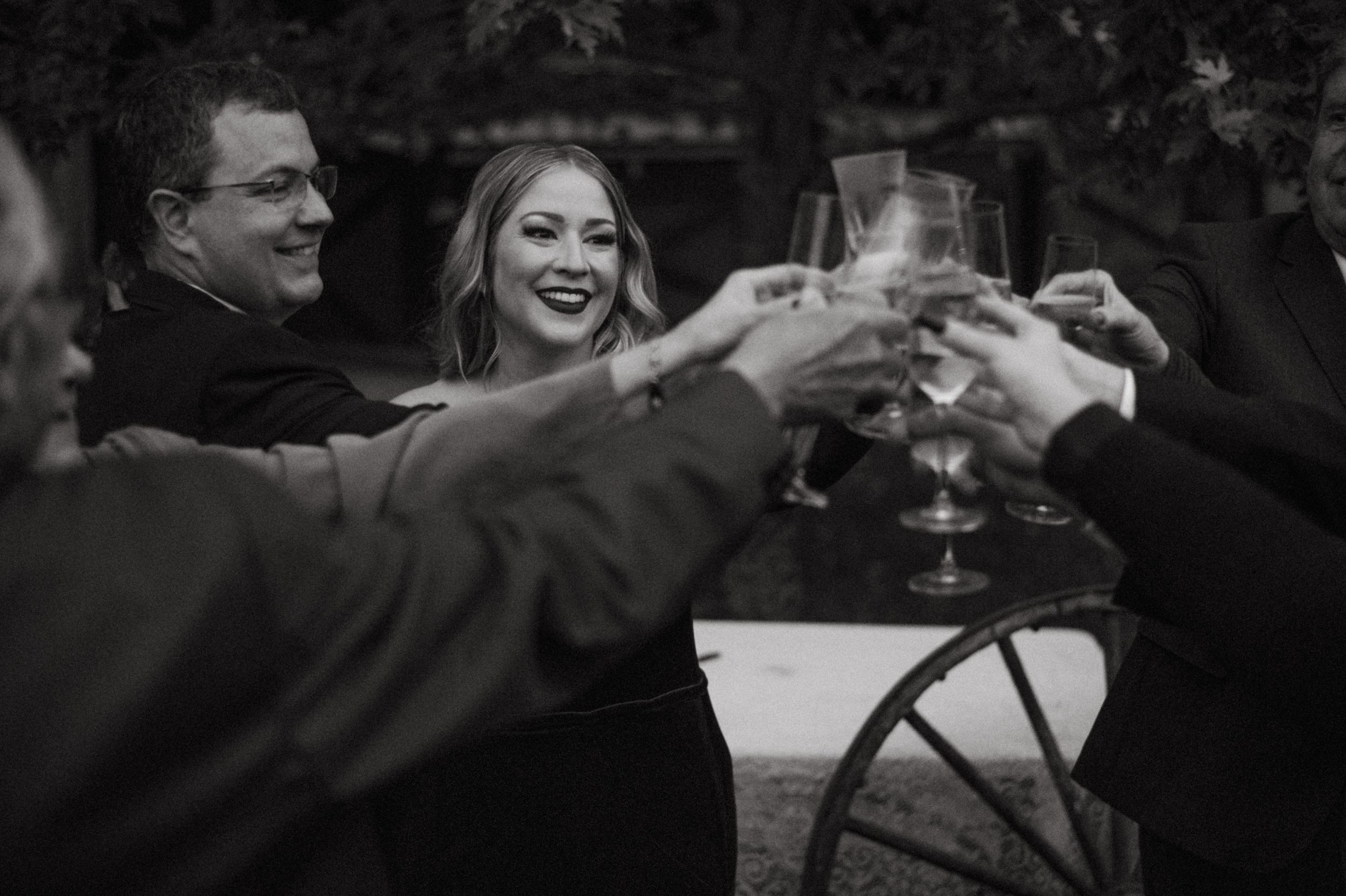 Black and white photos show a couple dancing and celebrating together at what appears to be a wedding reception.