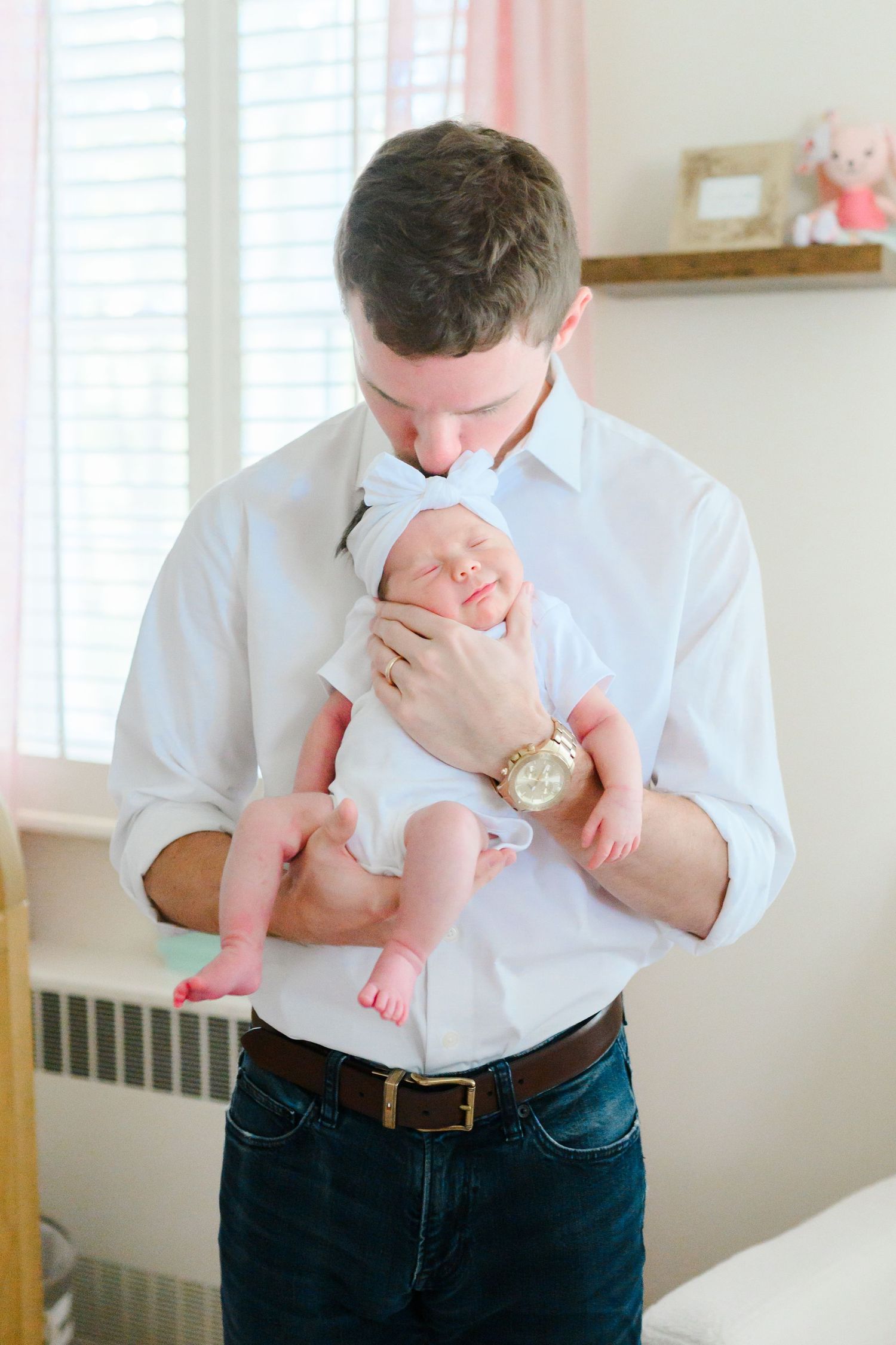Lifestyle newborn photography in Lynchburg, VA highlighting connection and soft, natural light.