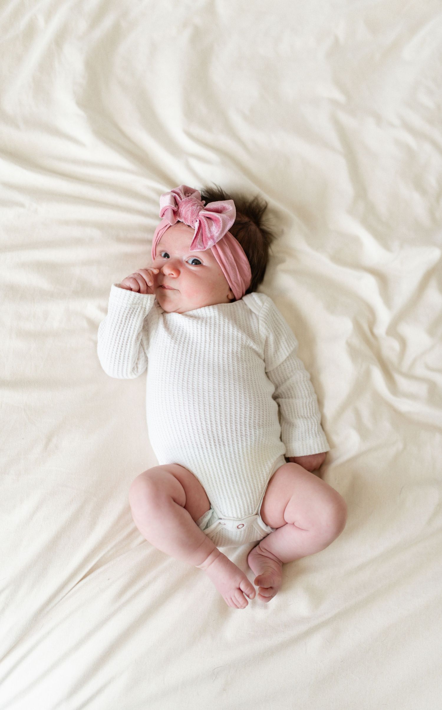 St. Charles County newborn photographer master bedroom family session.