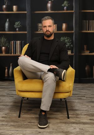 man posing for branding photography at gorilla studio