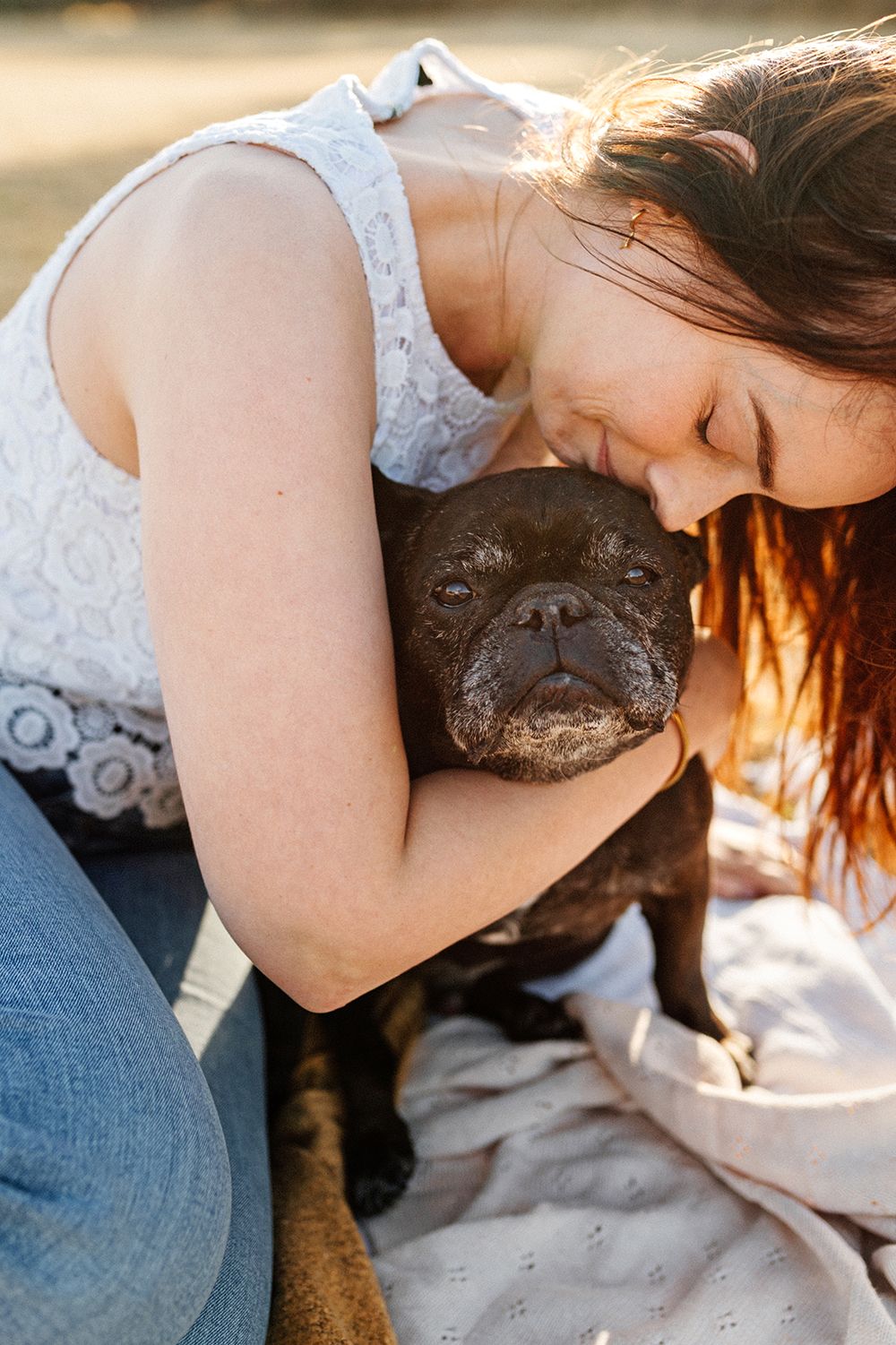 Dog and owner during senior photo session