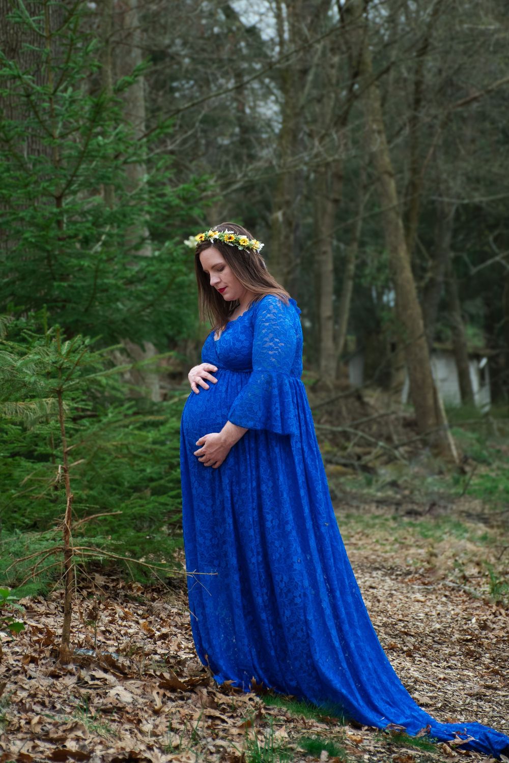 Forest maternity shoot embracing belly, Johnstown Pennsylvania