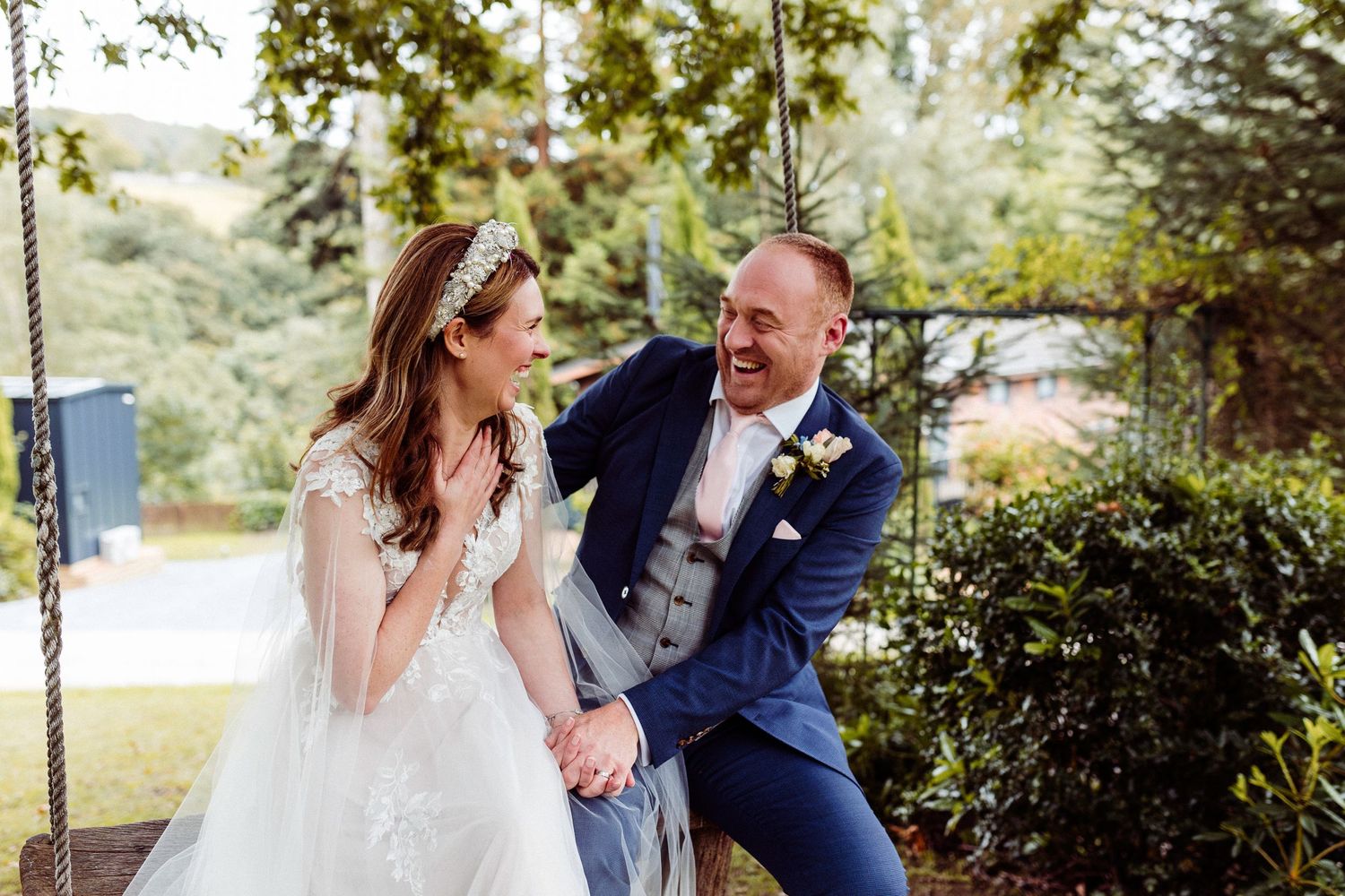 Lake District Wedding Photography: Bride and groom laughing at Broadoaks Country House and Hotel, Troutbeck