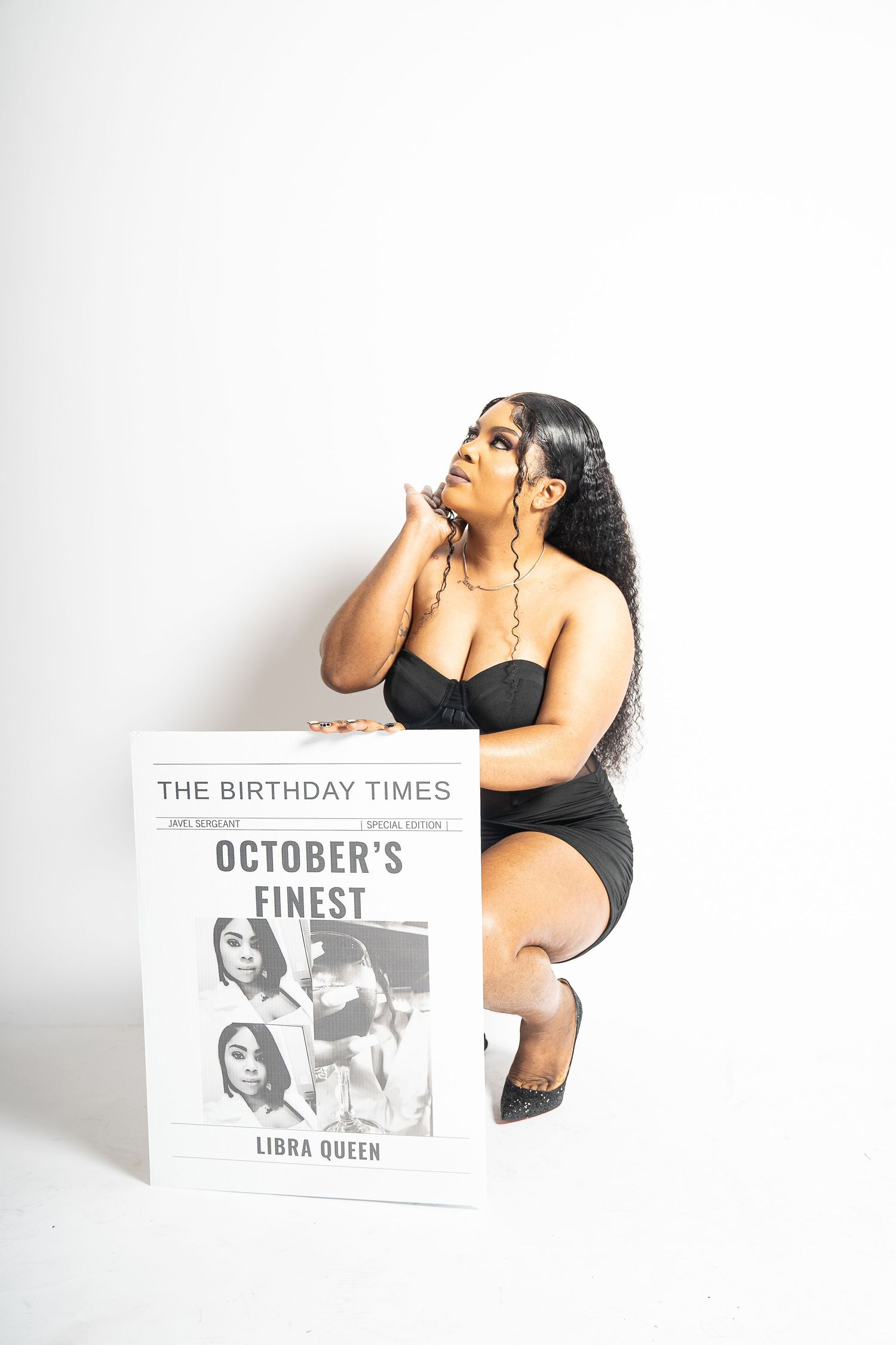Studio portrait with The Birthday Times magazine featuring October's Finest.
