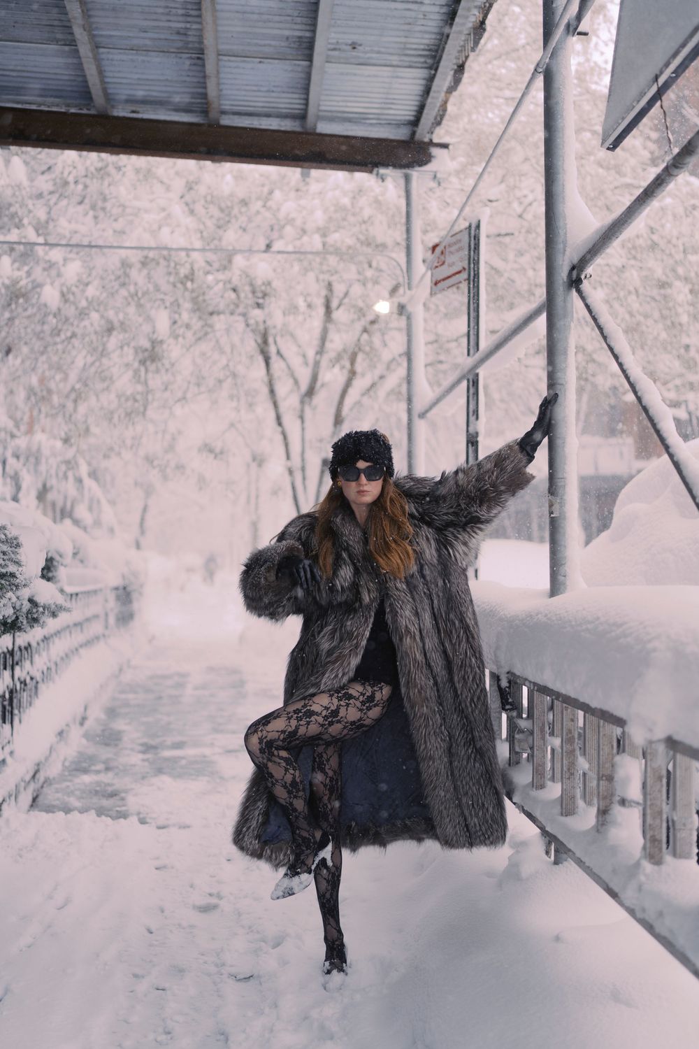 A series of snowy winter scenes with a person posing near a porch railing in dark winter clothing.
