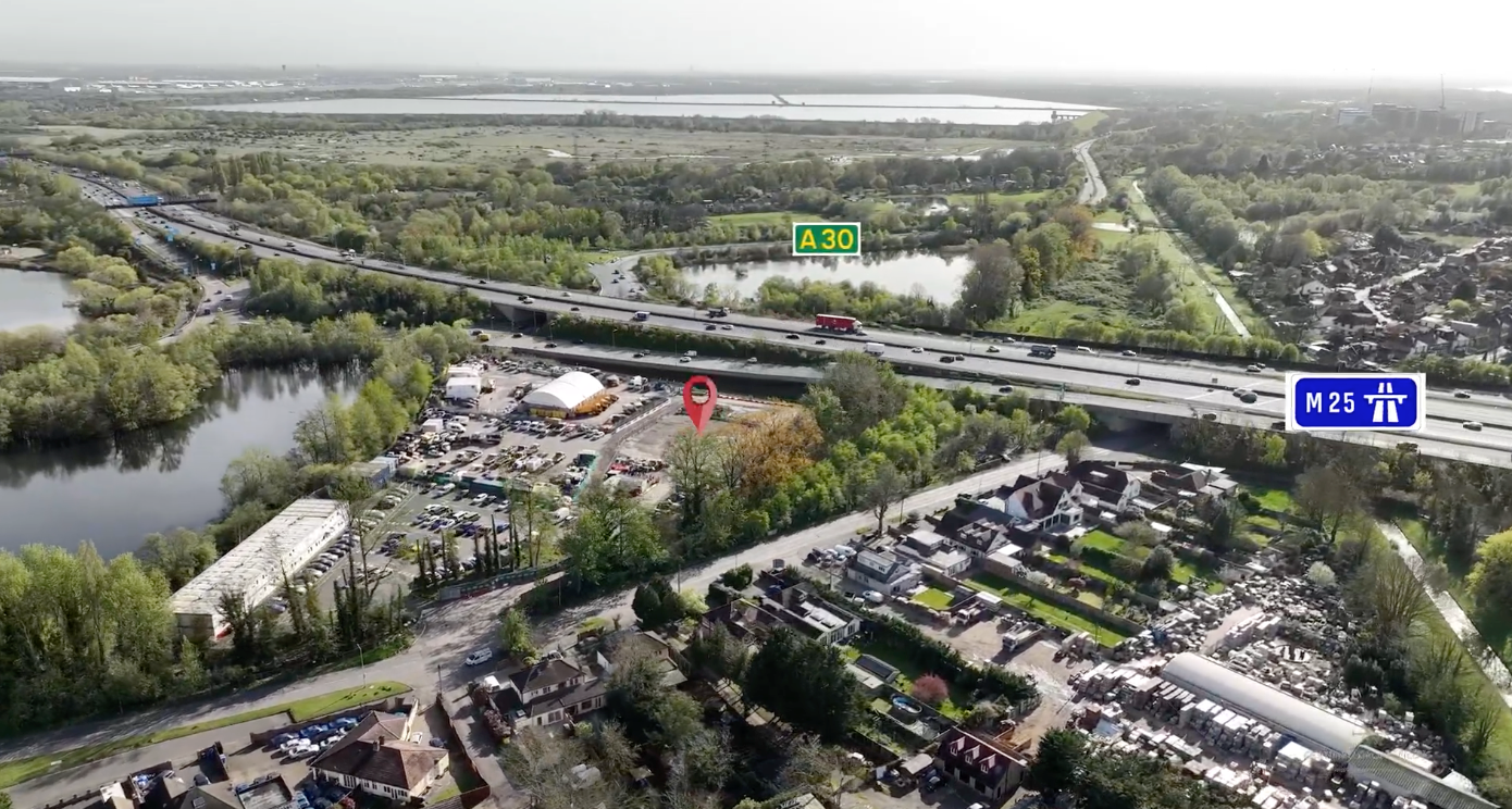 Aerial panoramic view of suburban development and waterways in a residential area during autumn.