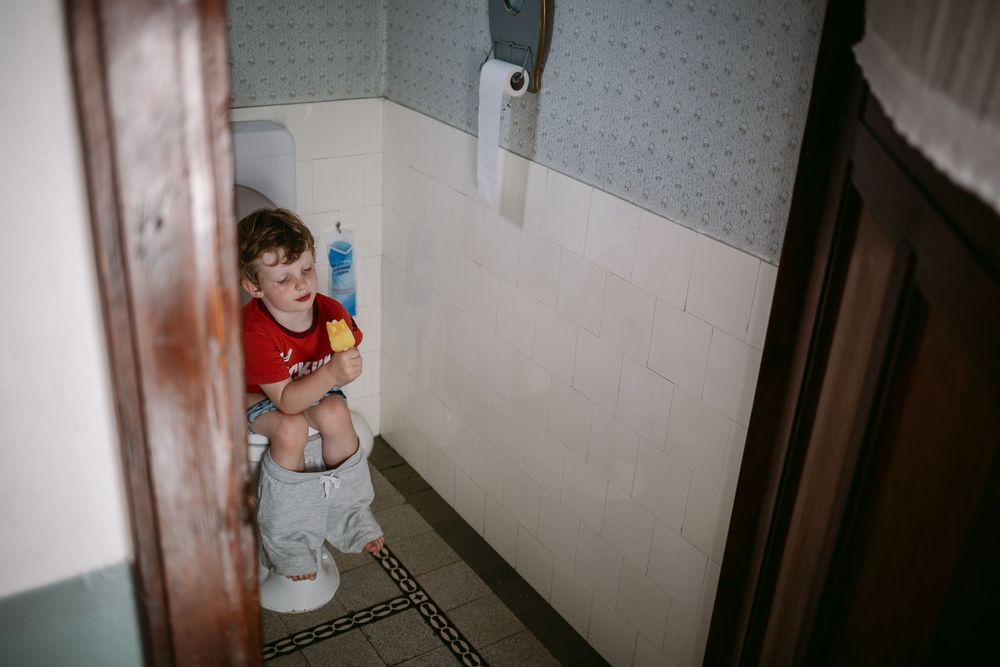 Vintage-style interior photographs showing hallway and bathroom spaces.