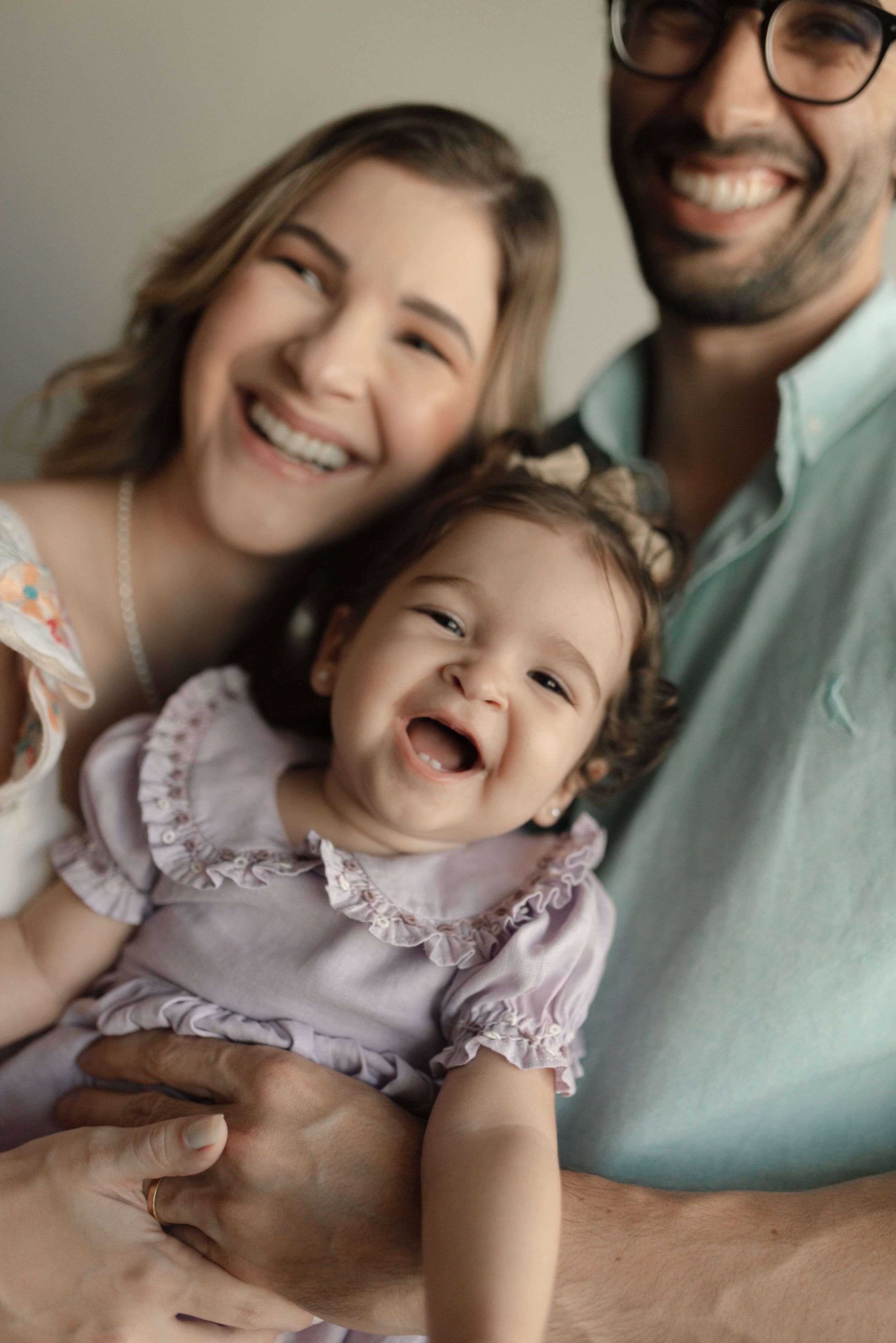 A series of candid shots showing joyful laughter and genuine expressions between two people in casual poses.