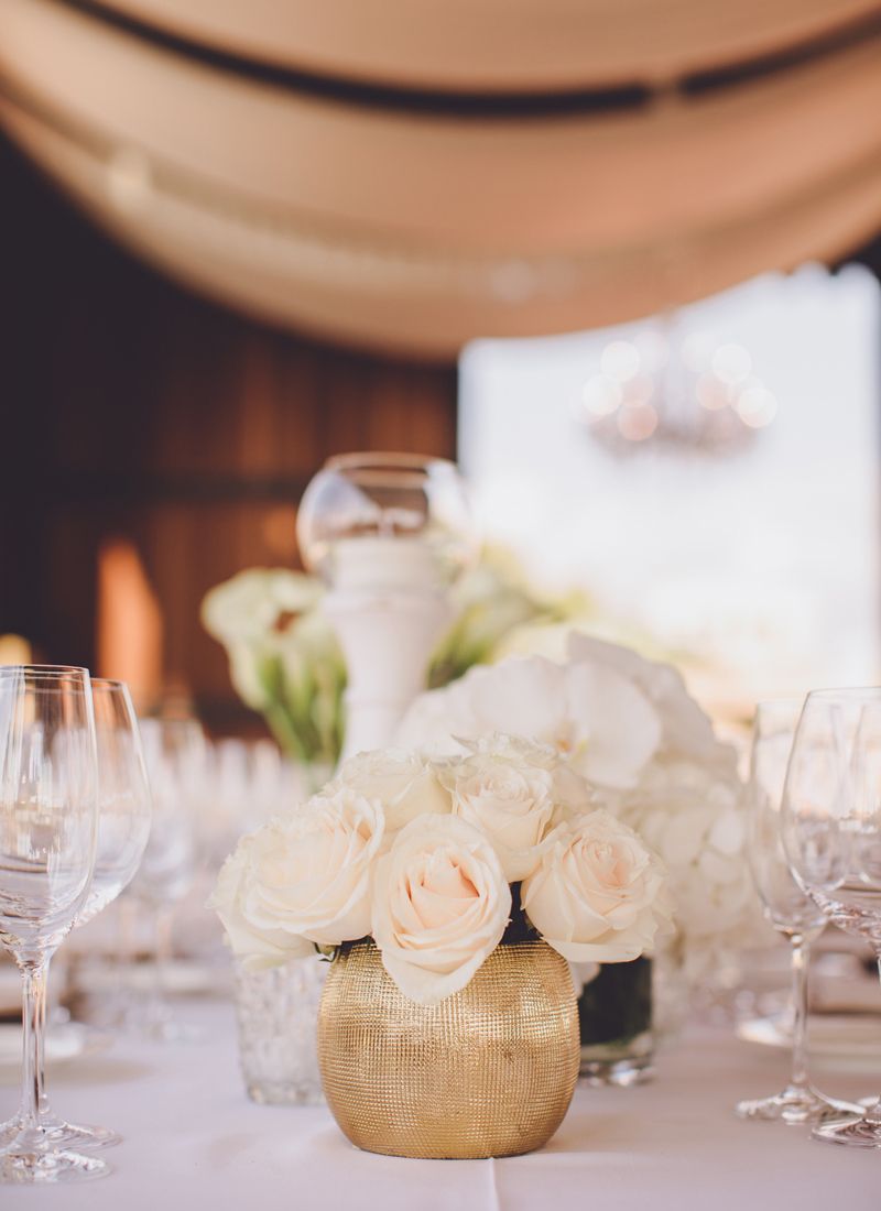 Table decoration in gold at Cap Rocat Wedding