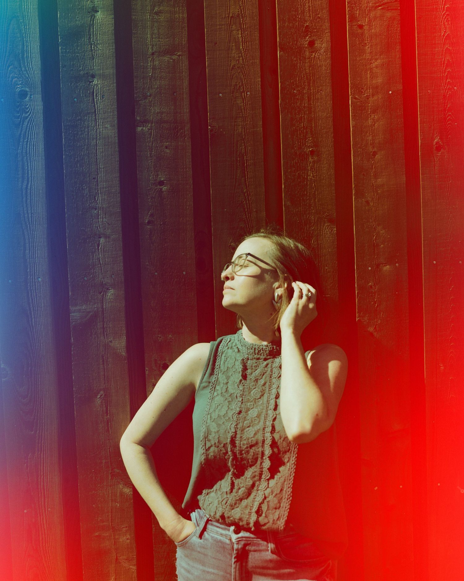 Woman in burgundy floral top shown in multiple close-up shots with varying expressions and poses.