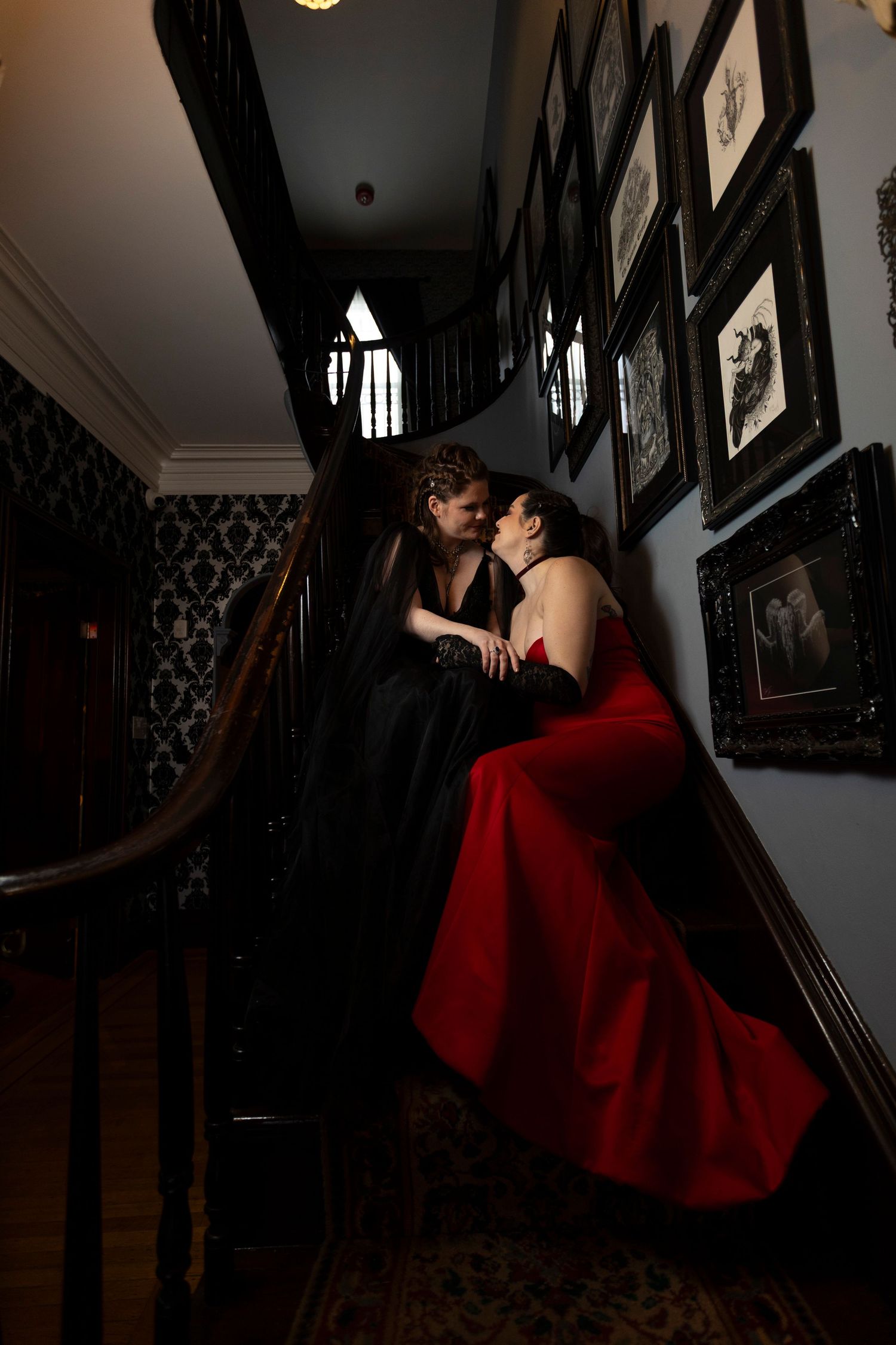 A queer couple pose together for their portraits on their elopement day in Salem, MA.
