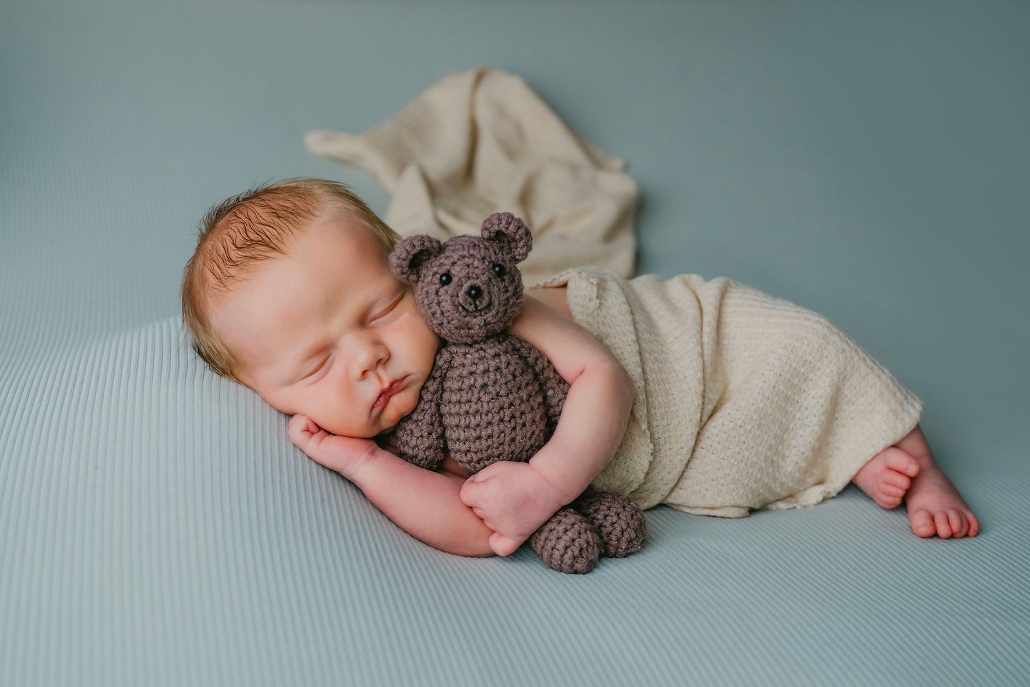 newborn, studio, side laying, props, West Michigan