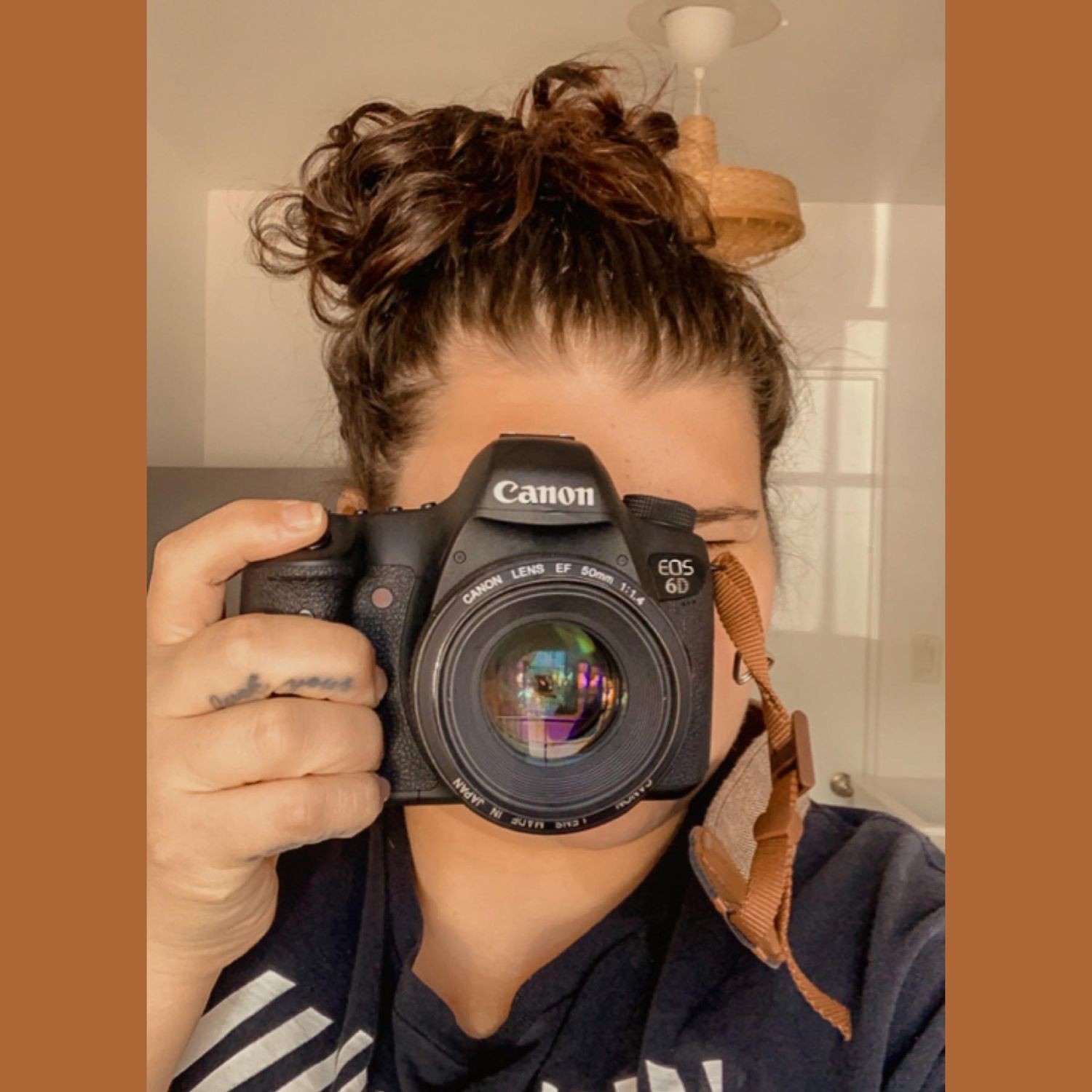 Three self-portrait images showing someone holding a black Canon camera in front of their face while taking photos.