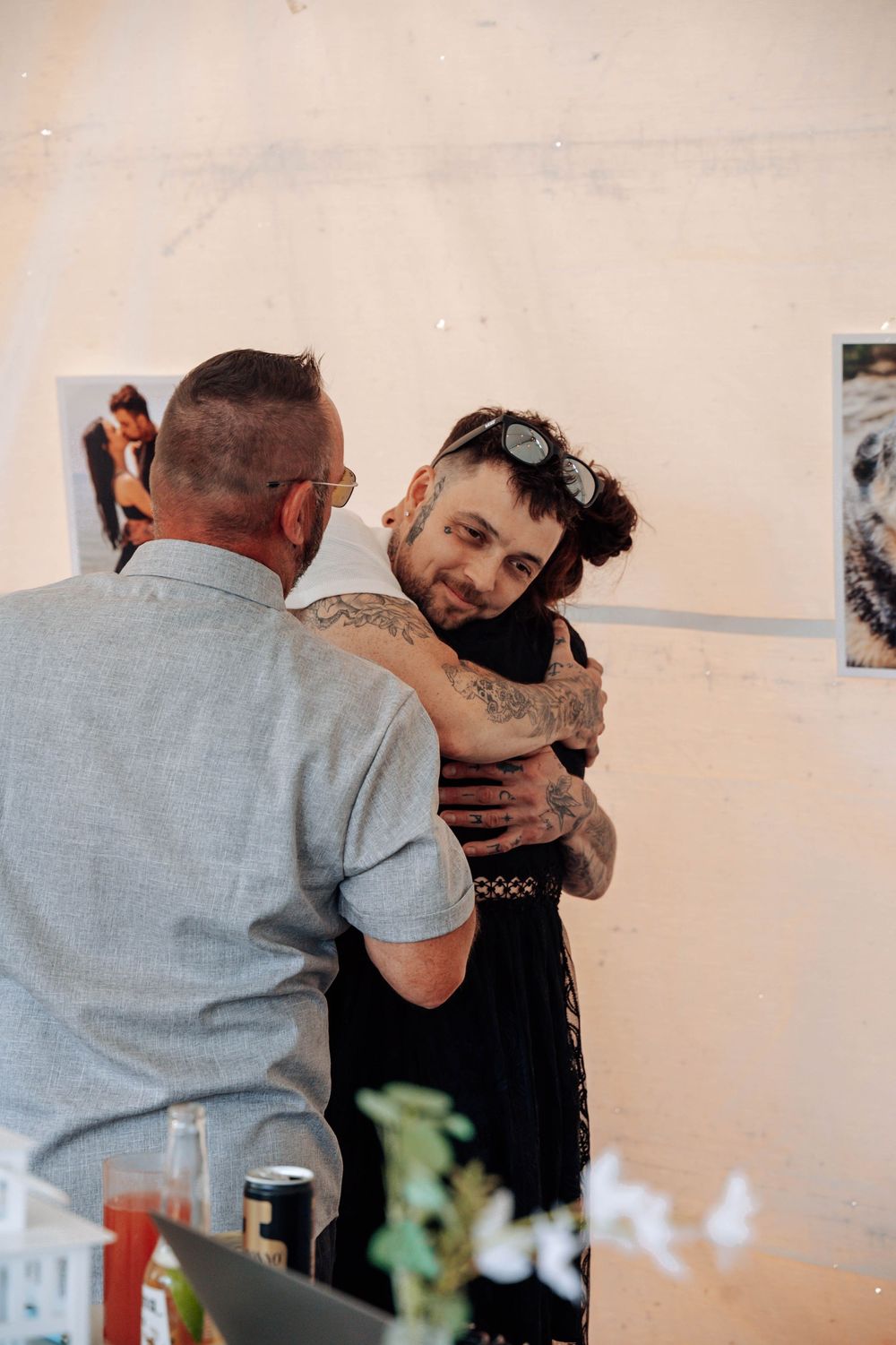Tender embraces and heartfelt moments during a wedding reception.