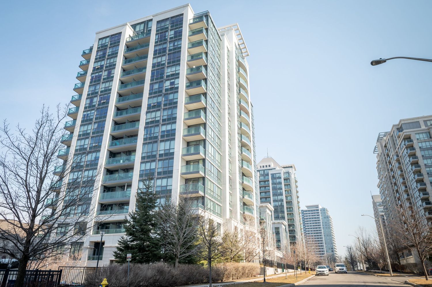 Exterior daytime photograph of a condo building in the GTA, taken for real estate photography.
