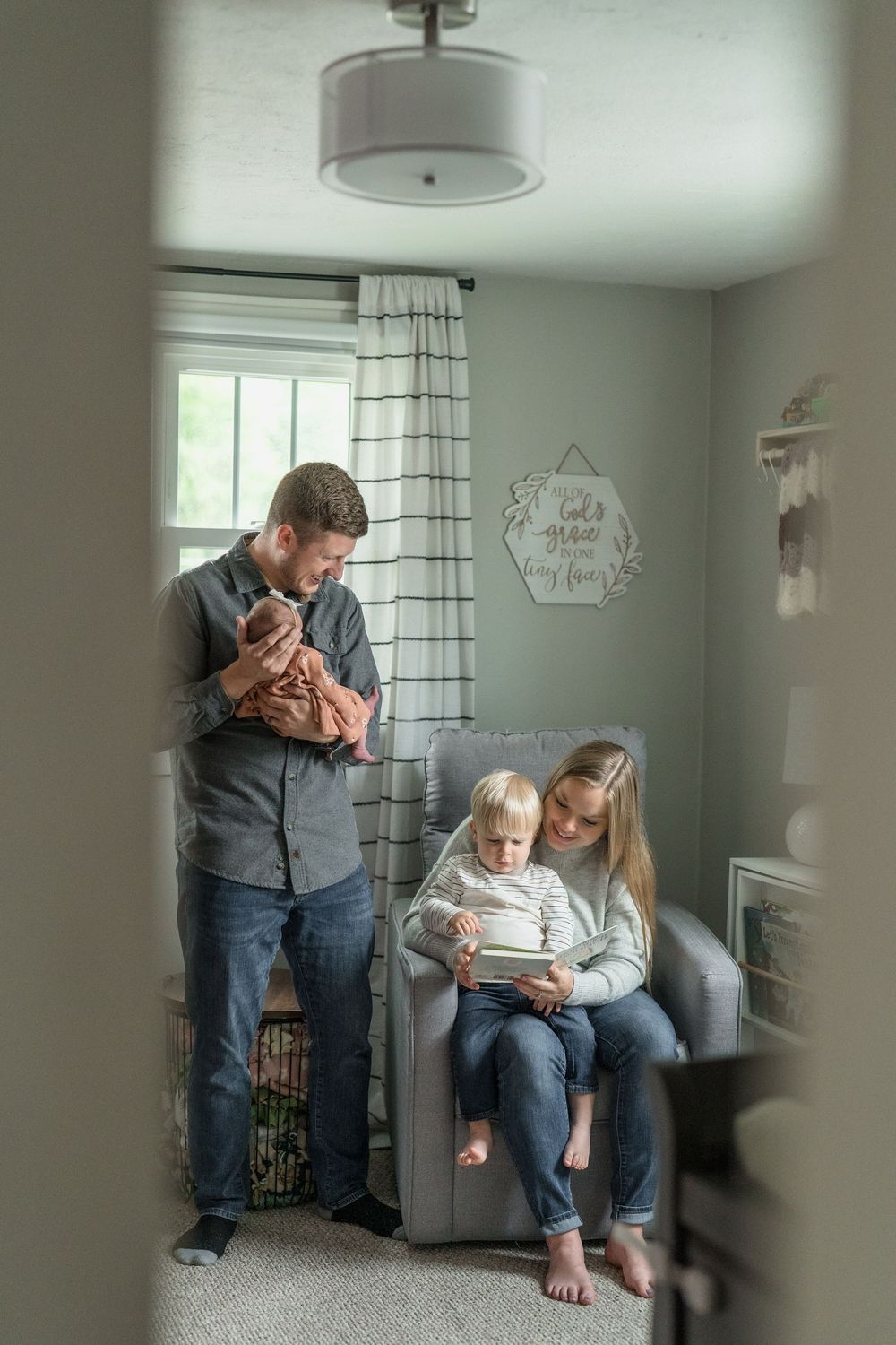 A series of candid lifestyle photos showing tender moments between parent and child in a bright home for newborn photos in Cuyahoga Falls OH