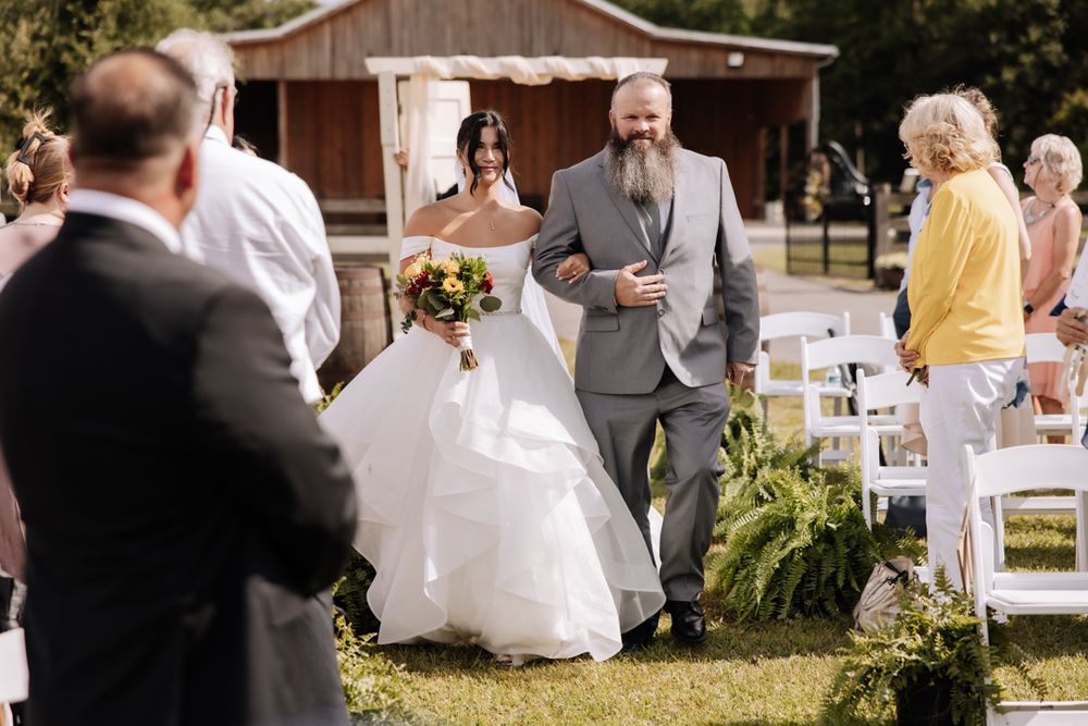 A collection of outdoor wedding reception snapshots showing candid moments with guests and tables arranged in a rustic setting.