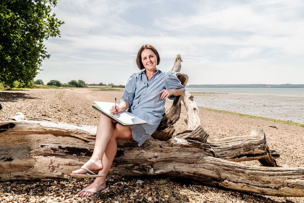 Personal branding portrait of Plant Seed founder Kate Cotterill on the Suffolk coastline, Harkstead
