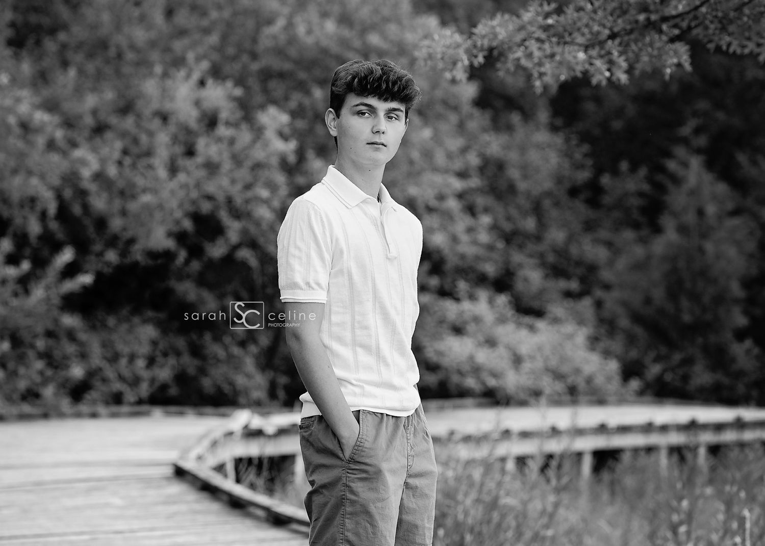 Vintage black and white portrait series shows subject in various poses and expressions against natural backdrop.