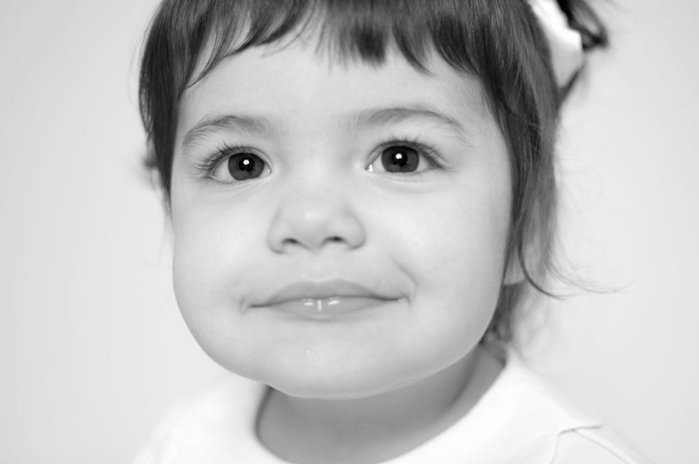 close up black and white of little girl