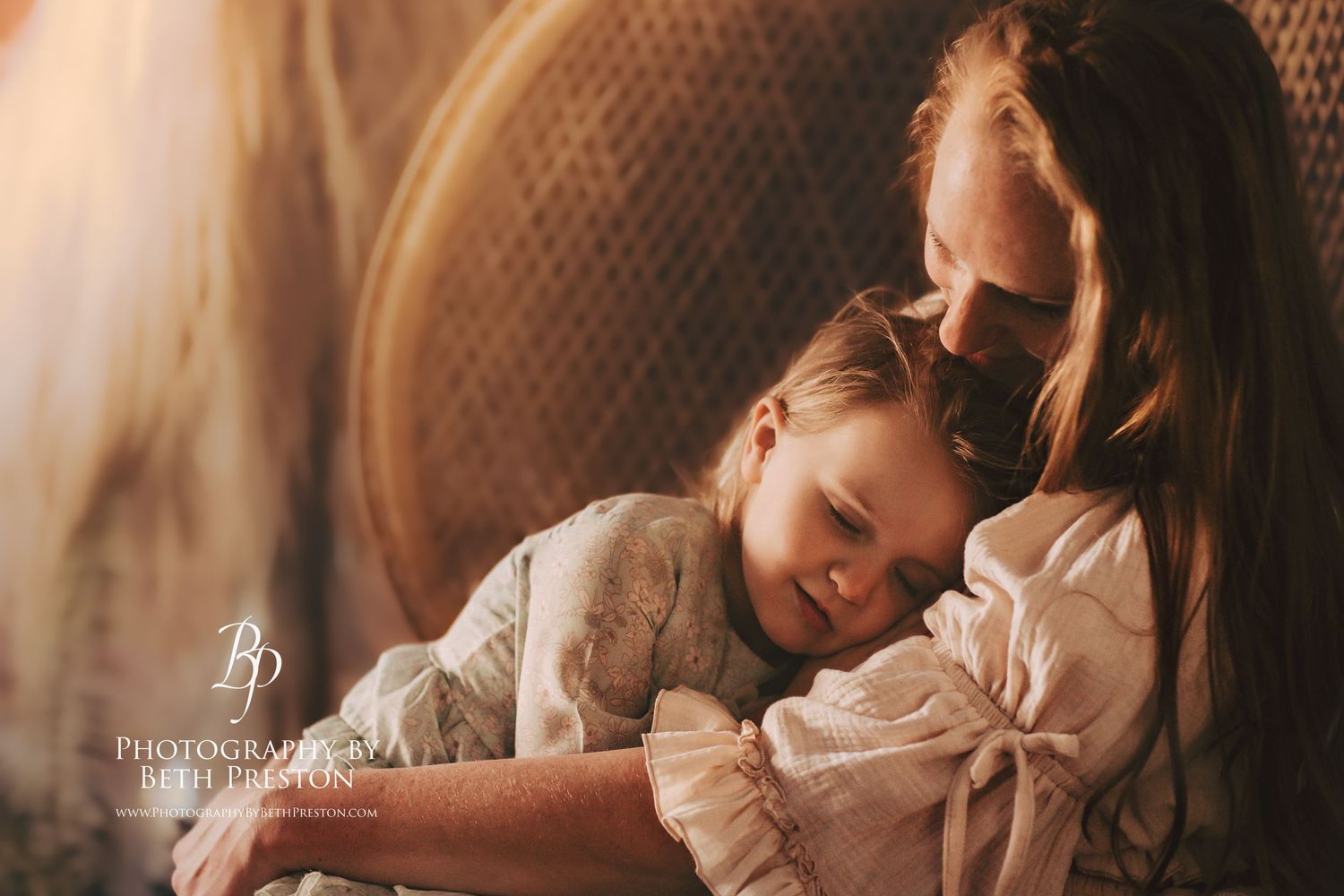 A tender moment captured between parent and child in warm lighting.