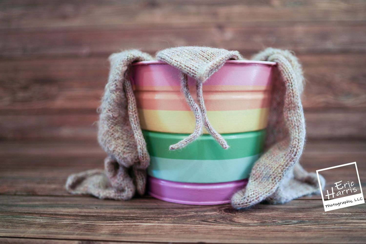 empty rainbow bucket with newborn wrap and bonnet Glenside PA newborn photographer