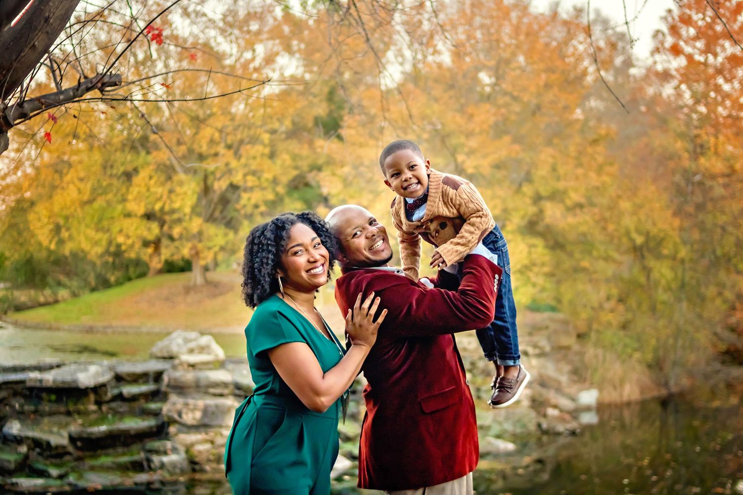 louisville family photography toddler boy fall papa johns park waterfall orange leaves