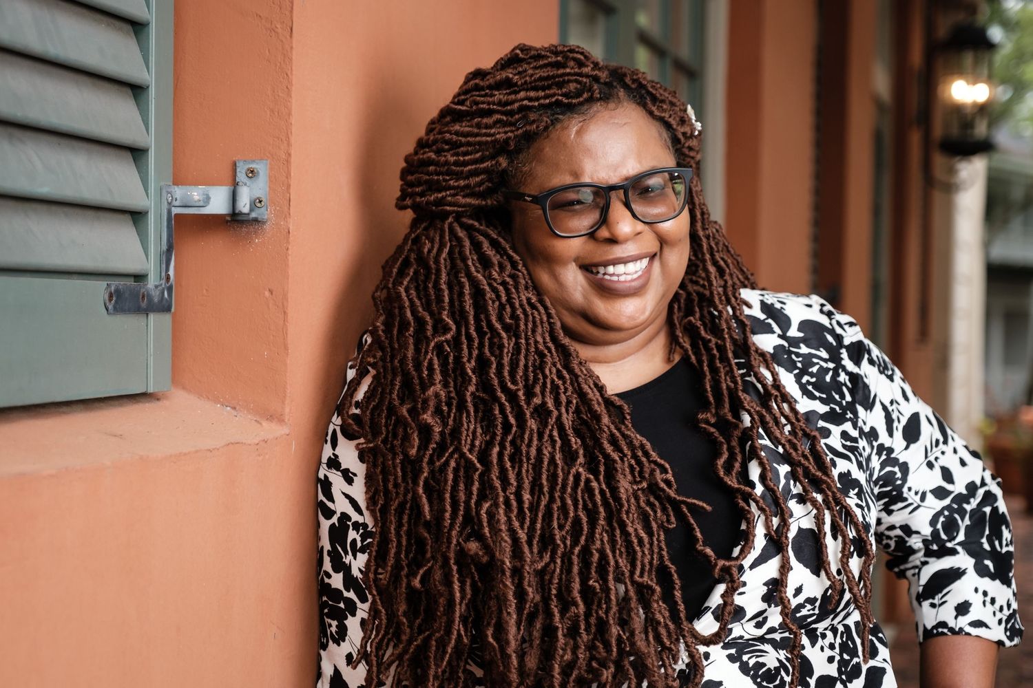 Vegan food blogger Michelle Blackwood poses for a portrait in the Haile Village Center in Gainesville, Fl.