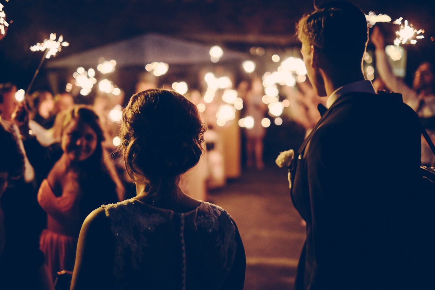 bridal and groom night reception party with romantic sparkling light