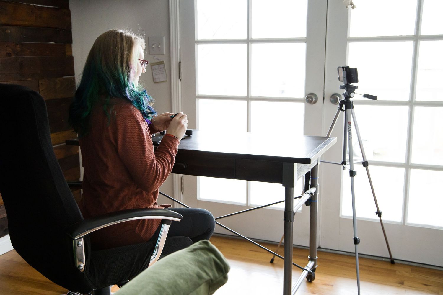 Mobile Film Maker in home office space making YouTube Video for Lifestyle branding Session