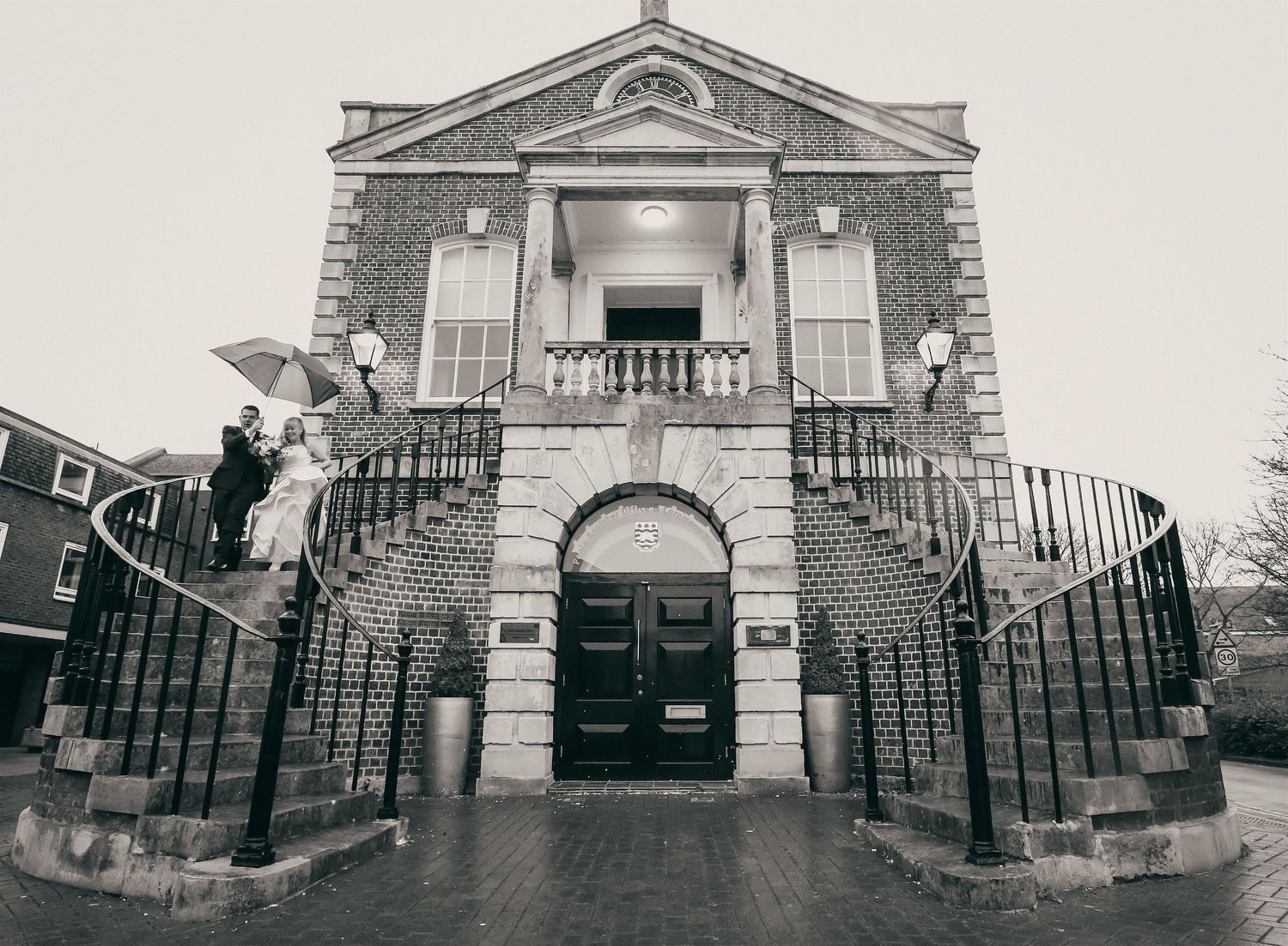 Bride and groom leaving the Guildhall Registry Office