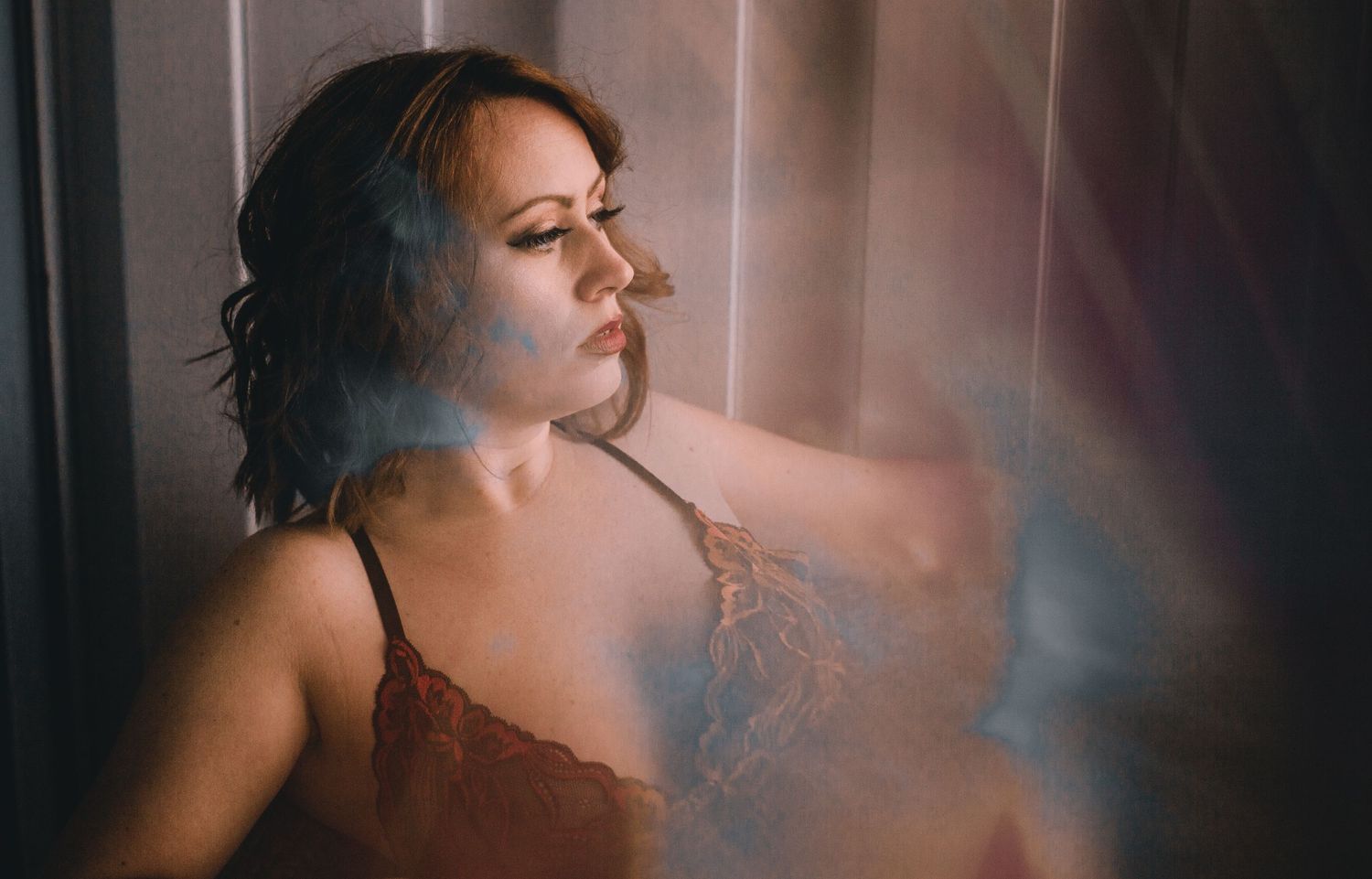 Between the sheets boudoir session Ashland Kentucky