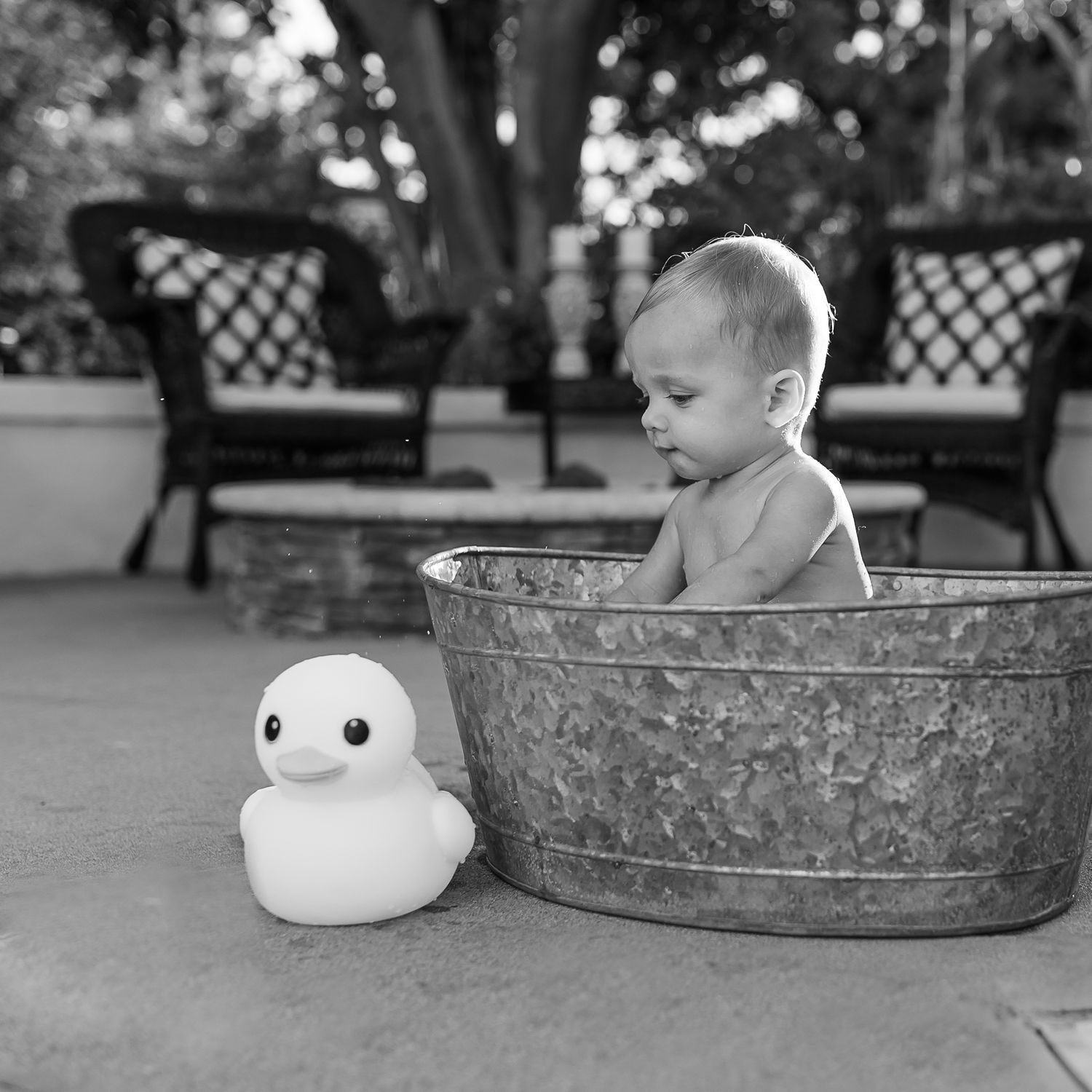 Rubber duck and baby outside