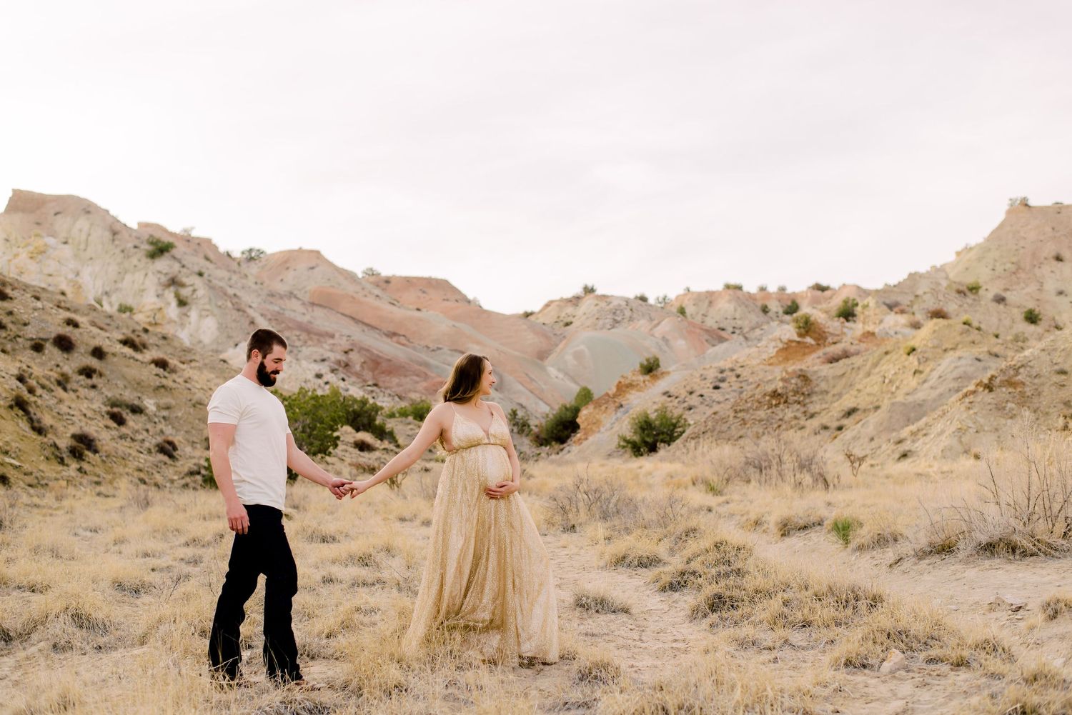White mesa NM maternity session gold and cream dress