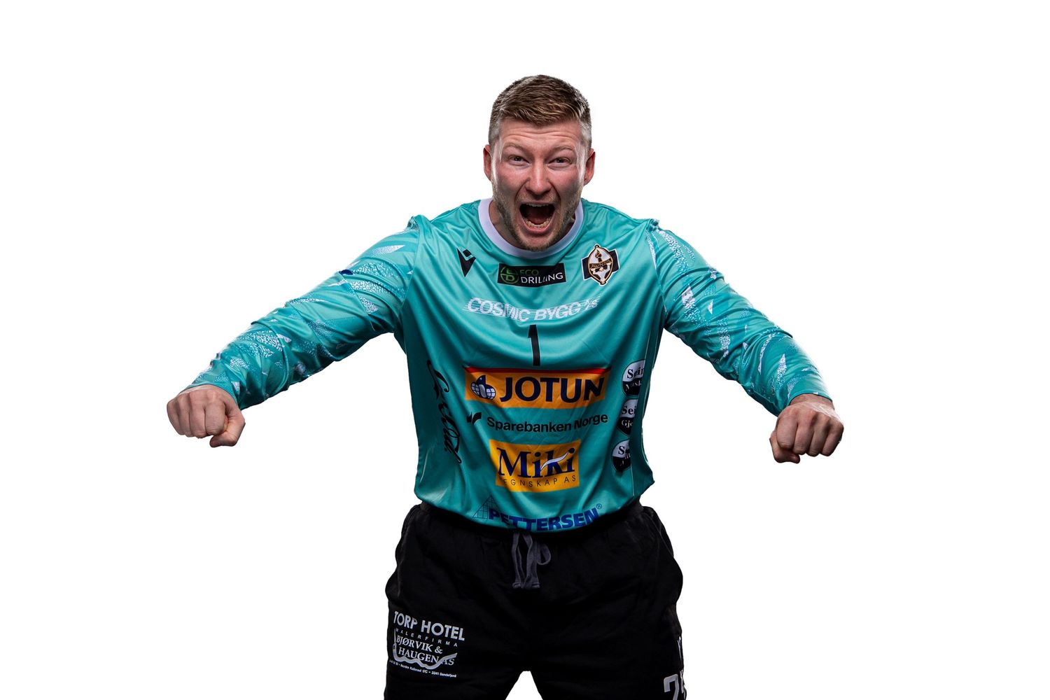 Soccer players display white team jerseys with sponsor logos including Jotun, Mini, and Pettersen on the front.