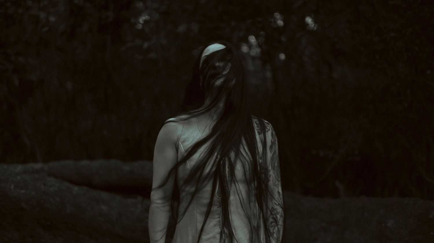 A dark and moody collection of six connected photographs showing a person in shadowy lighting against black backgrounds.