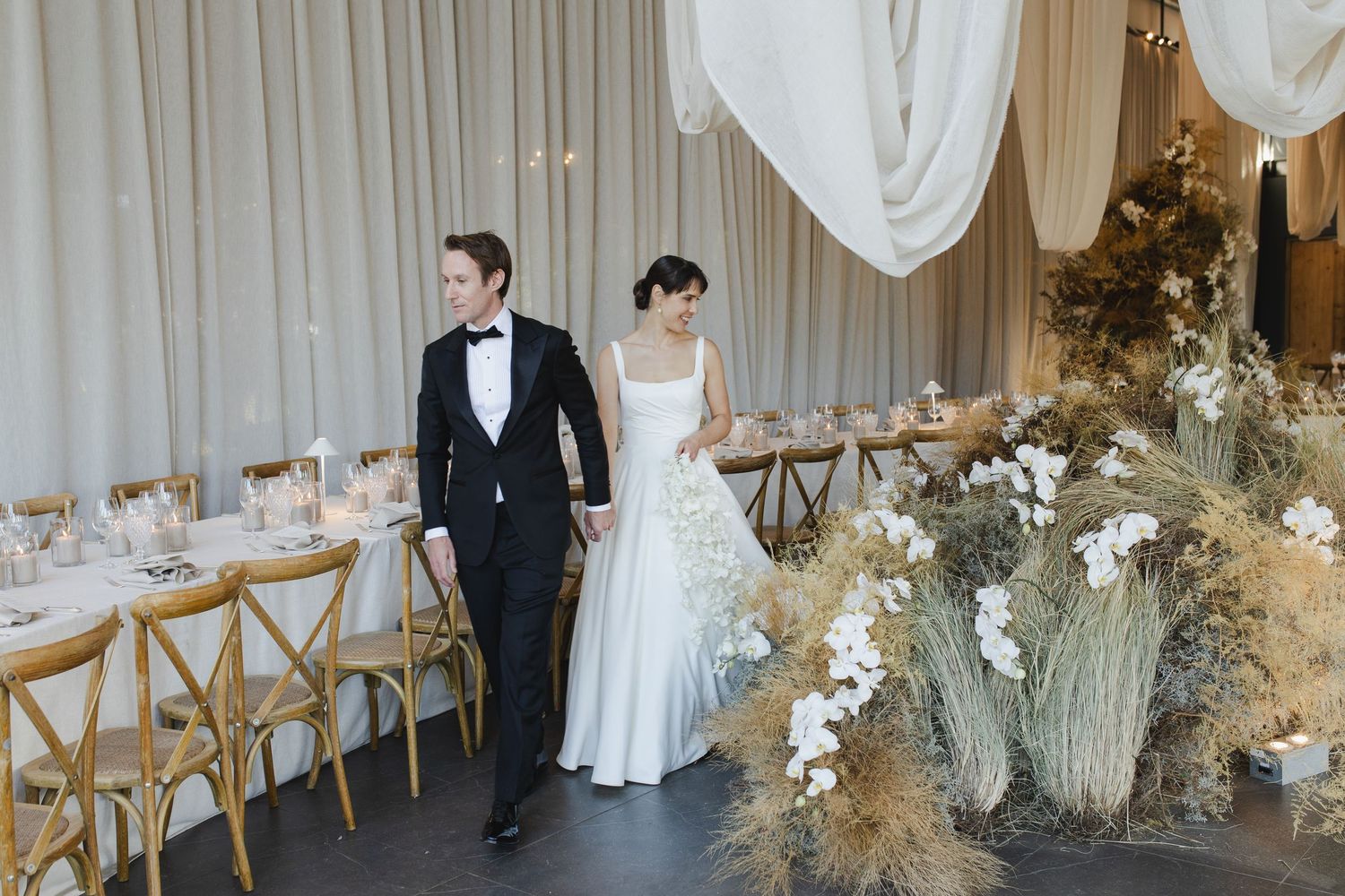 Bride and Groom walk through reception venue at Plaisir Wine farm for the first time
