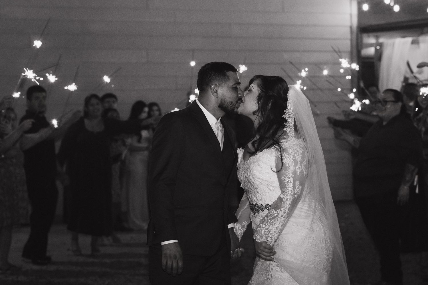 Black and white photo montage showing wedding reception dance floor moments and celebrations.
