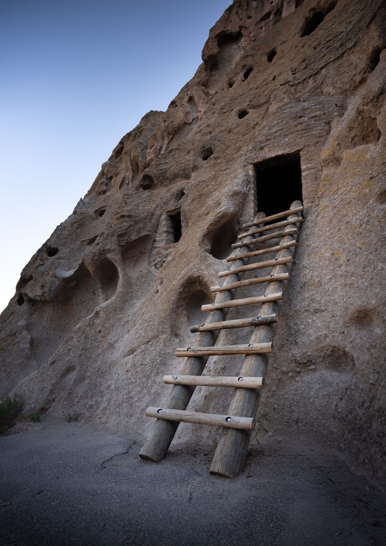 A ladder leads to an ancient cave dwelling in Bandelier National Monument in New Mexico.