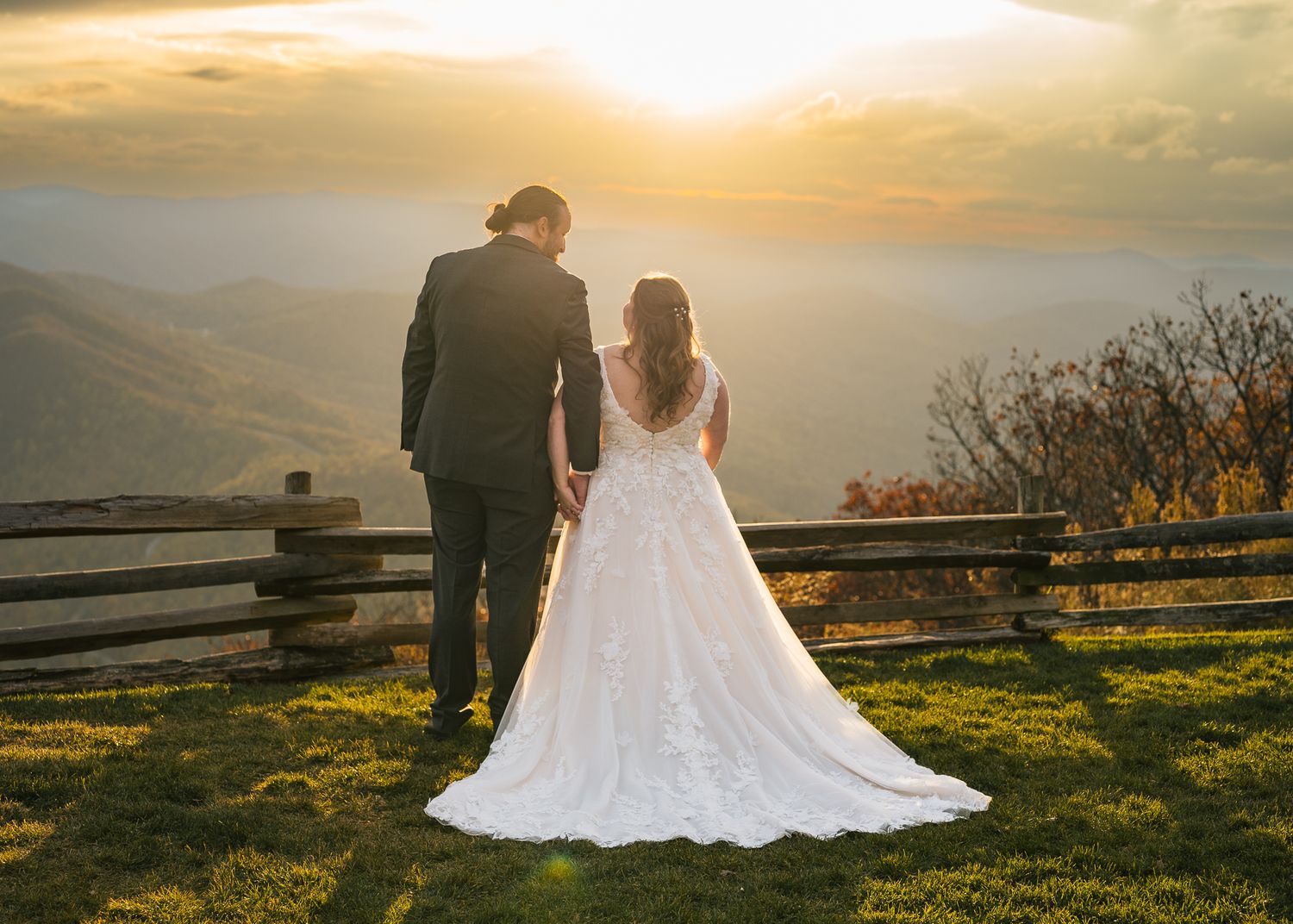 Bride and Groom at golden hour looking out over the Blue Ridge Mountains - Indea Grace Photography