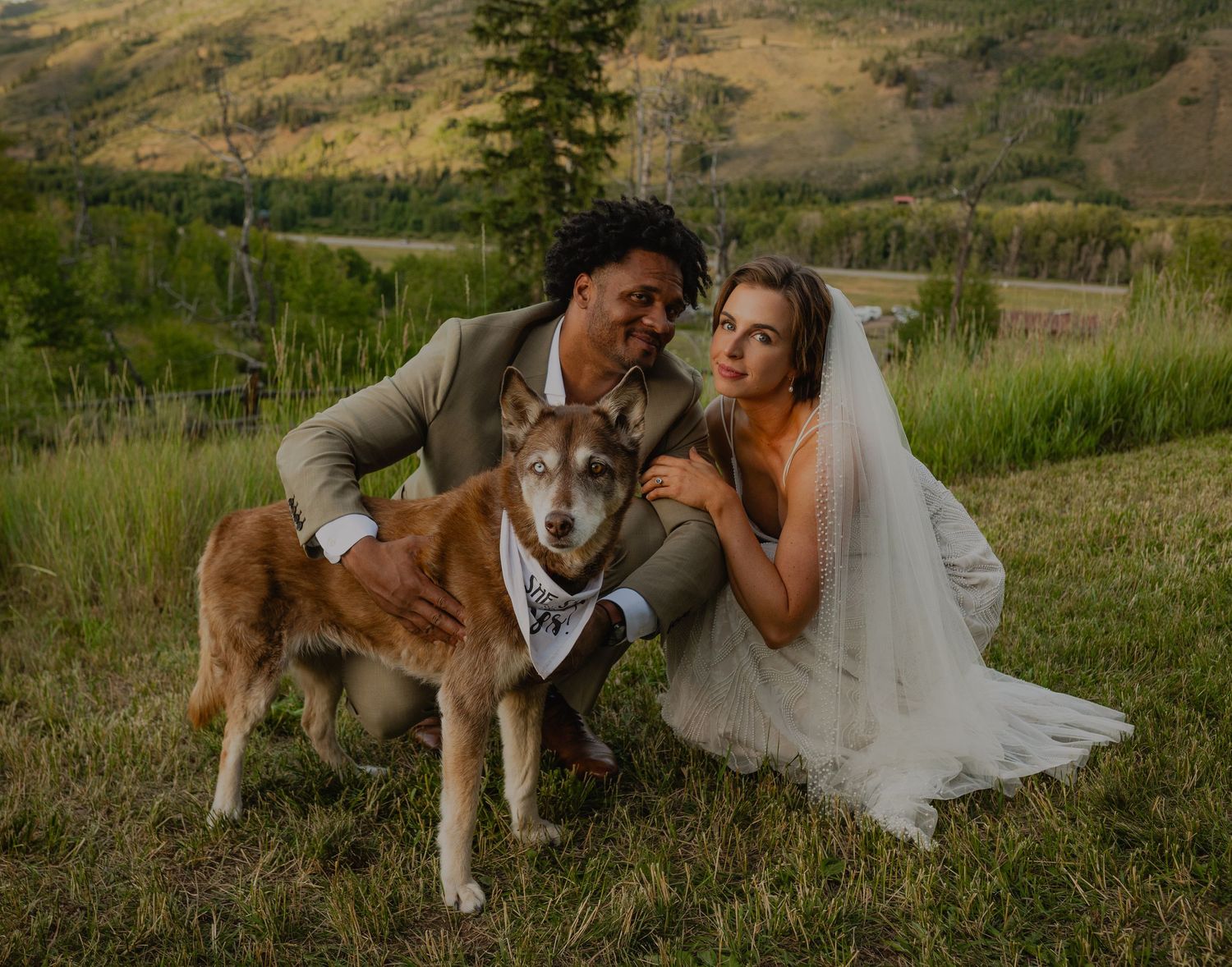 Bride and groom sharing a kiss at Apache Ranch in Silverthorne