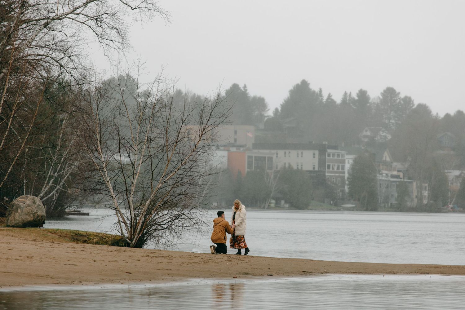 SURPRISE ENGAGEMENT PROPOSAL PHOTOGRAPHY MIRROR LAKE LAKE PLACID NEW YORK ADIRONDACK MOUNTAINS