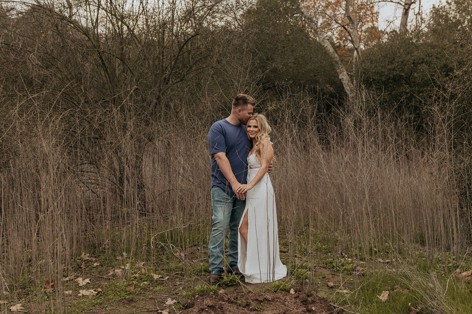 Romantic outdoor photo session in a natural wooded setting at sunset in San Diego.