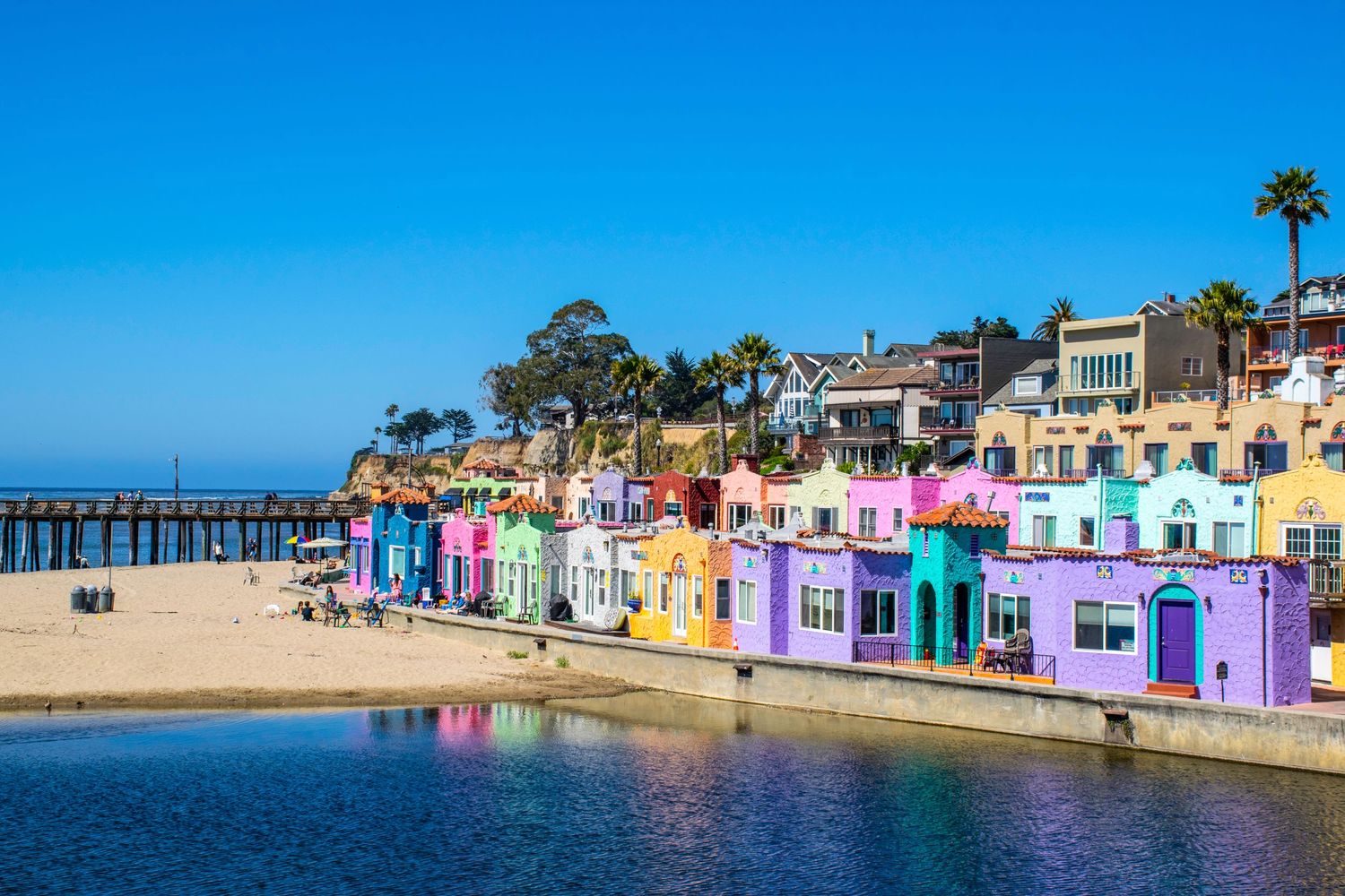 Colorful beachfront houses line the waterfront of Capitola Village in California.