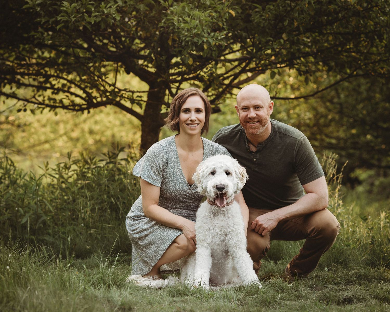 Professional photo of a family with their dog