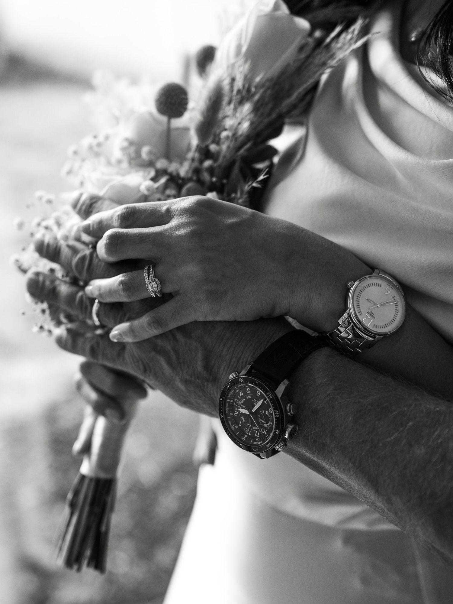 Black and white close-up sequence showing hands adjusting and setting a wristwatch in multiple steps in Naples, Florida