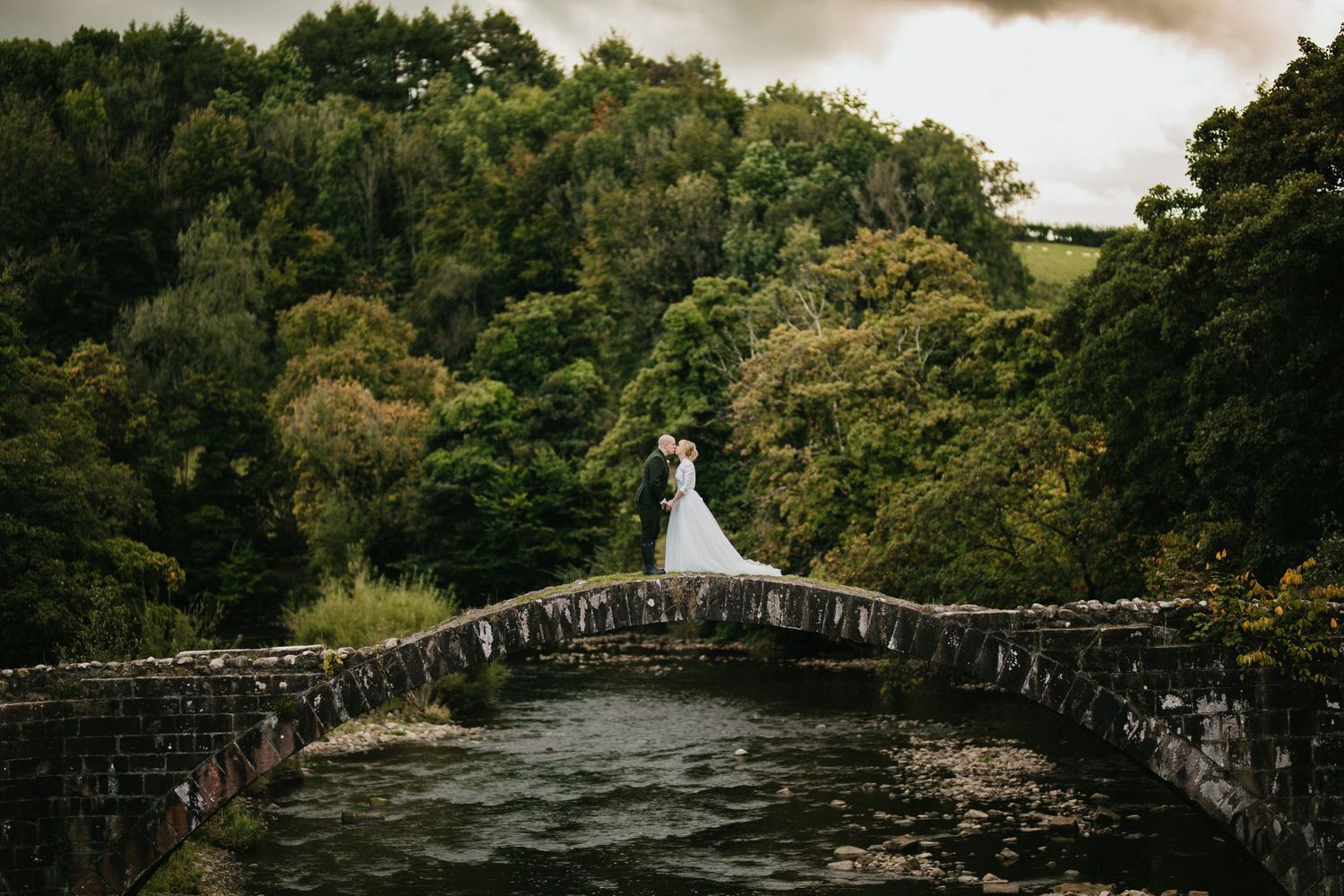 bride groom rustic country wedding Cromwells bridge by lancashire wedding photographer