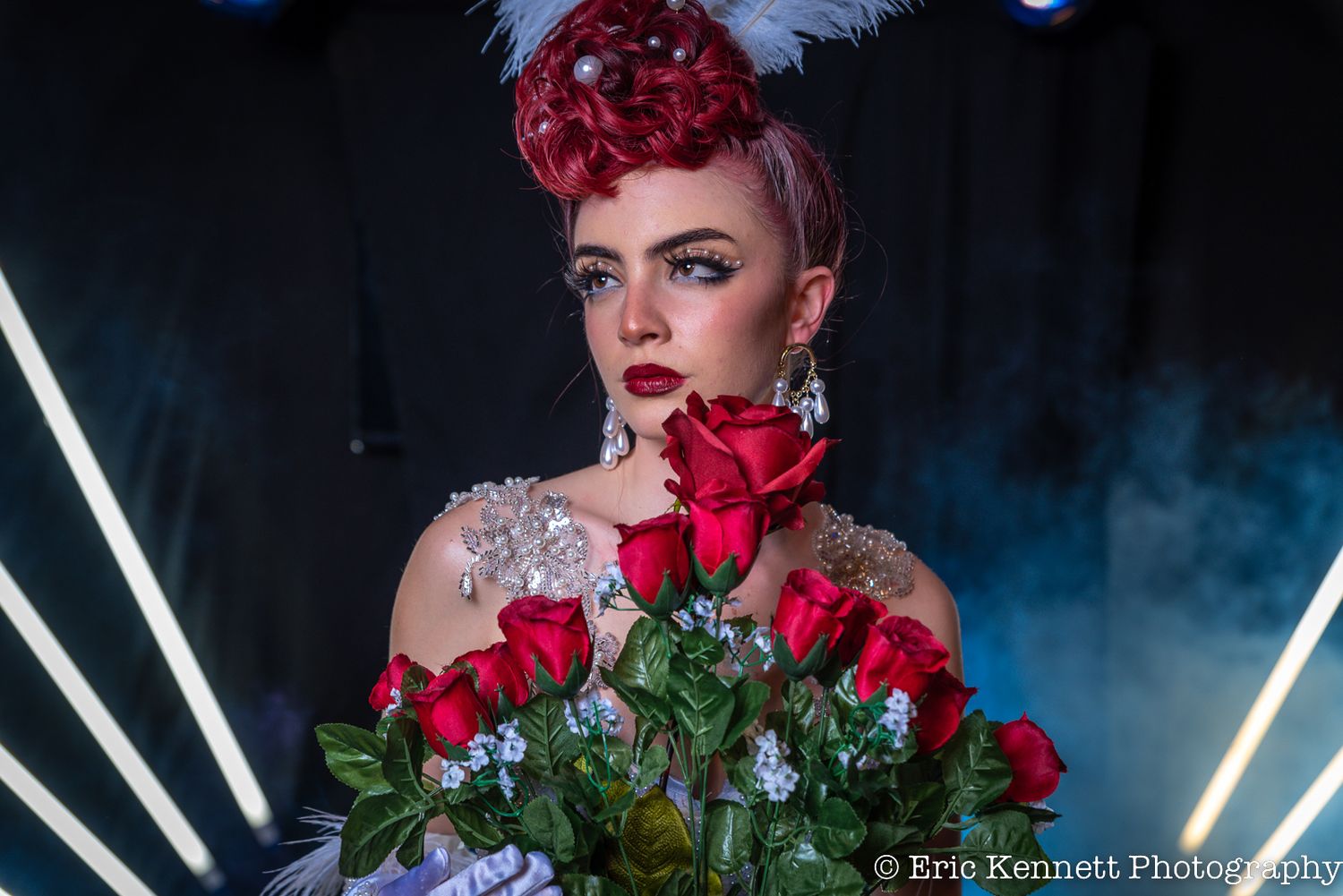 burlesque model holding flower bouquet