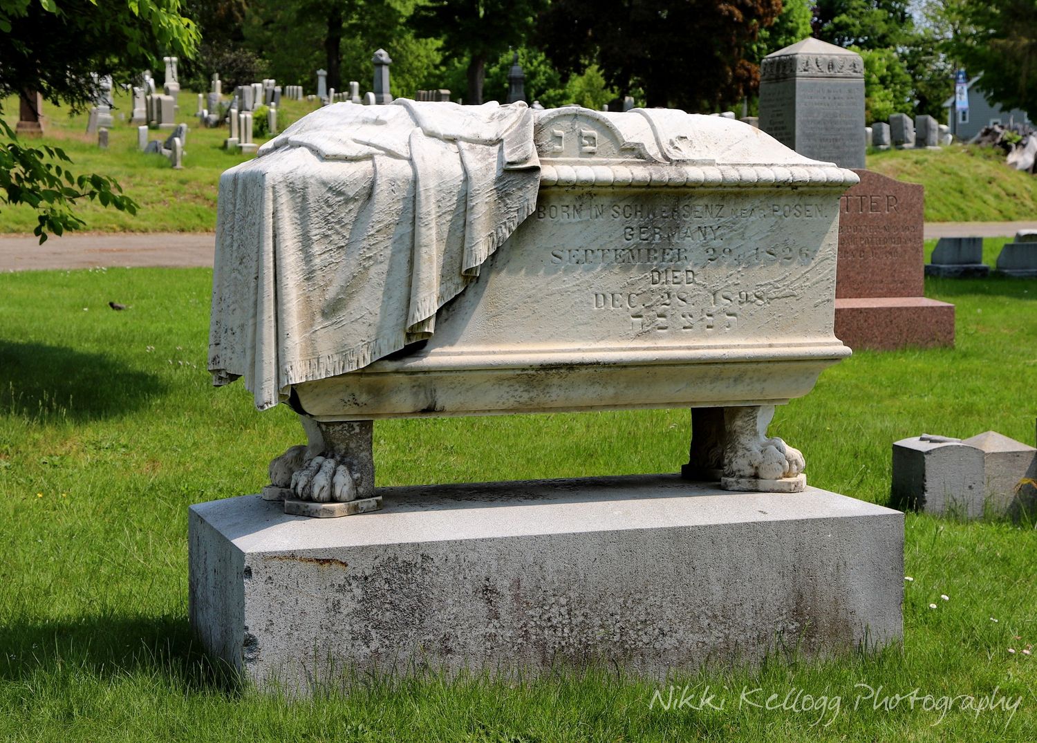 draped gravestone